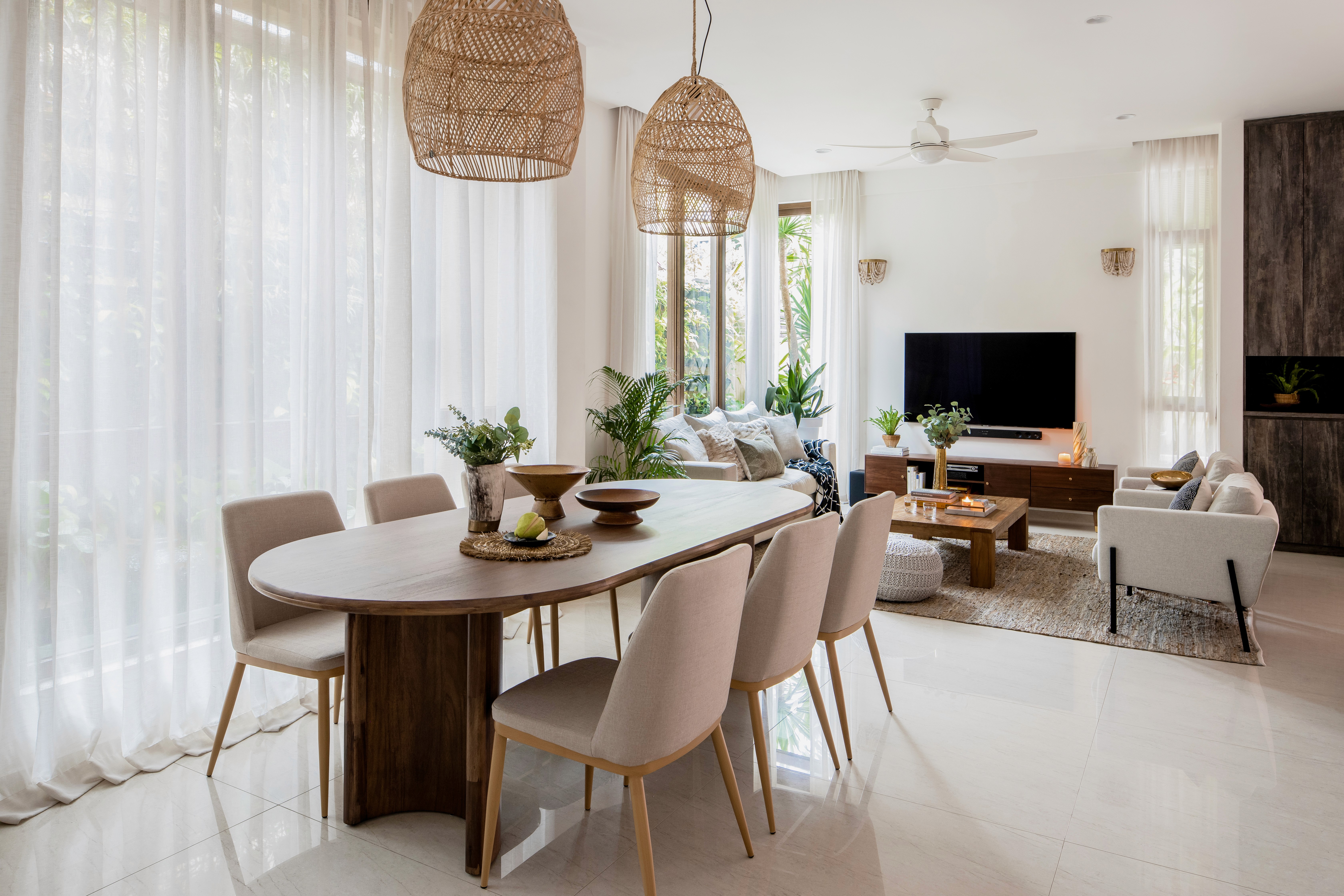 Boho chic dining and living room with a mix of patterns, textures, and colors by Ventura & Los Angeles interior designer Jubilee Interiors