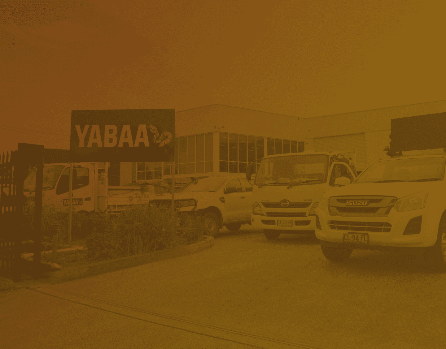 Fleet of Yabaa traffic control vehicles with yellow background overlay