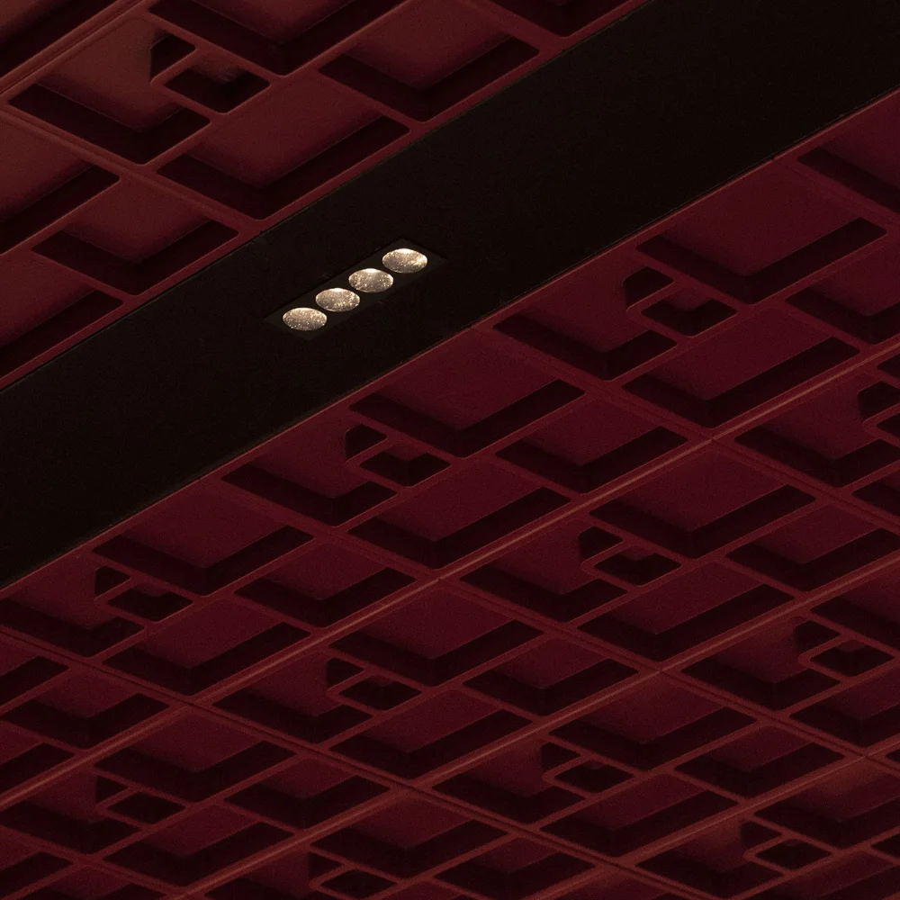 a woman laying on a chair in a room