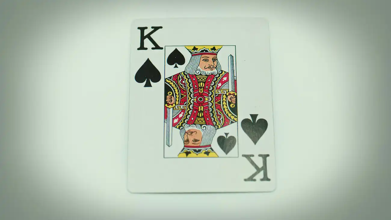 A close-up of the king of spades playing card, symbolising the Kings League football format and its innovative game rules.