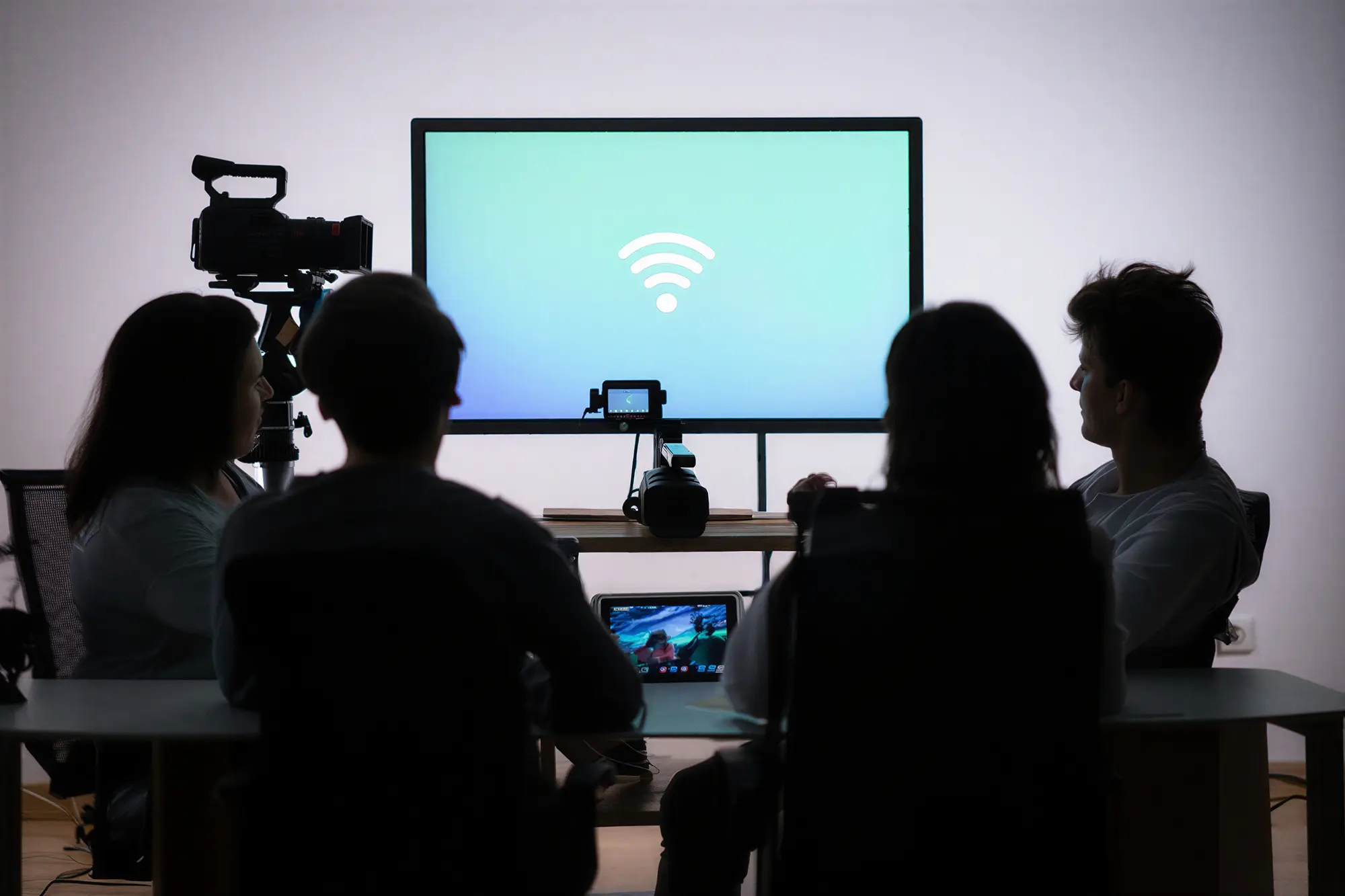 Production team with video streaming equipment