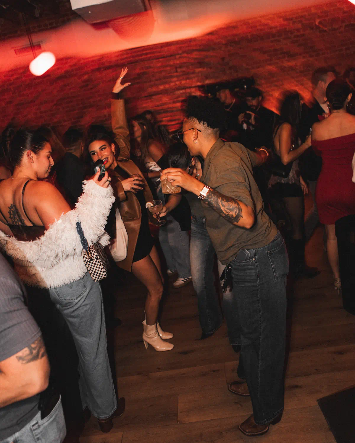 A group of young men sitting on stairs