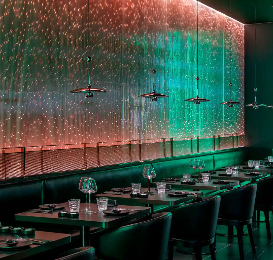 Sushi Club Avignon dining room beneath the starry wall of light