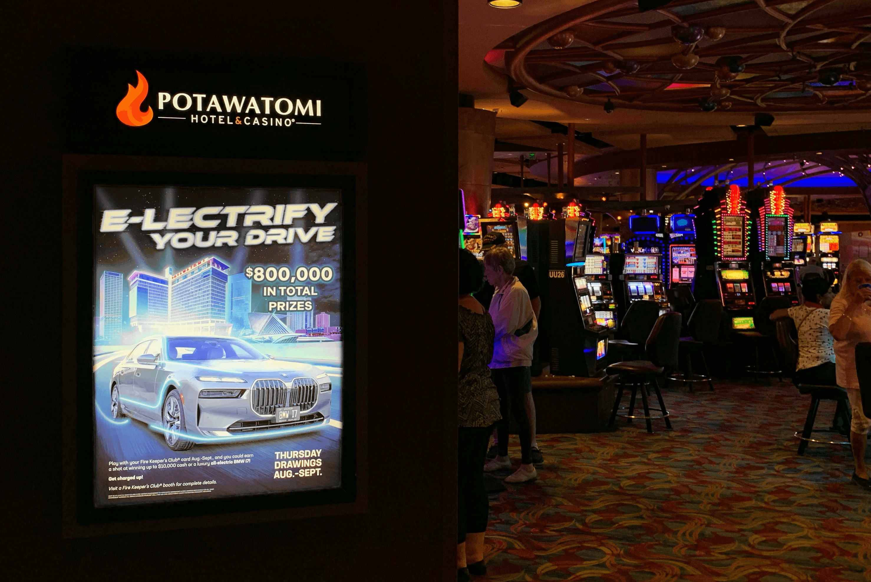 Backlit sign with E-lectrify Your Drive art