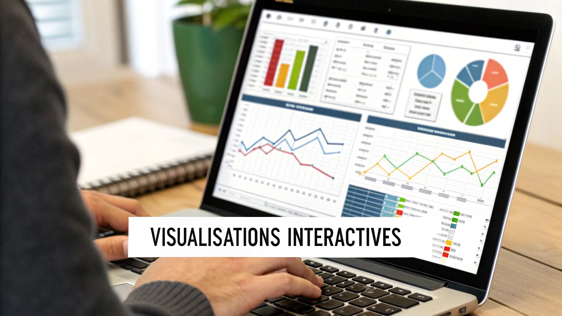 Personne utilisant un ordinateur portable affichant un tableau de bord avec des graphiques et des données pour des visualisations interactives.