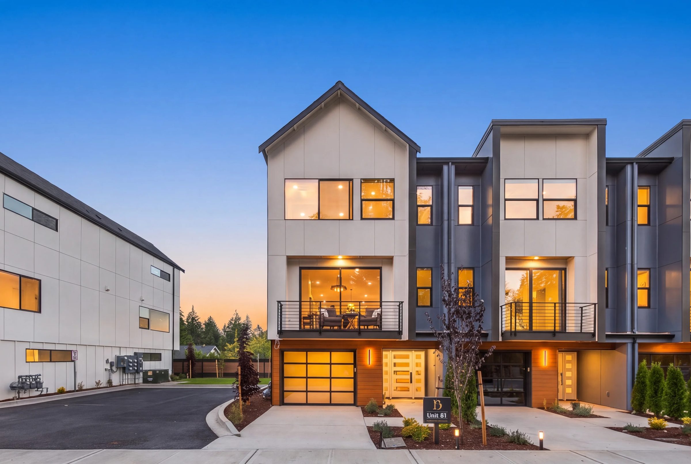 Duchess Luxury Townhomes front elevation at dusk, Bothell