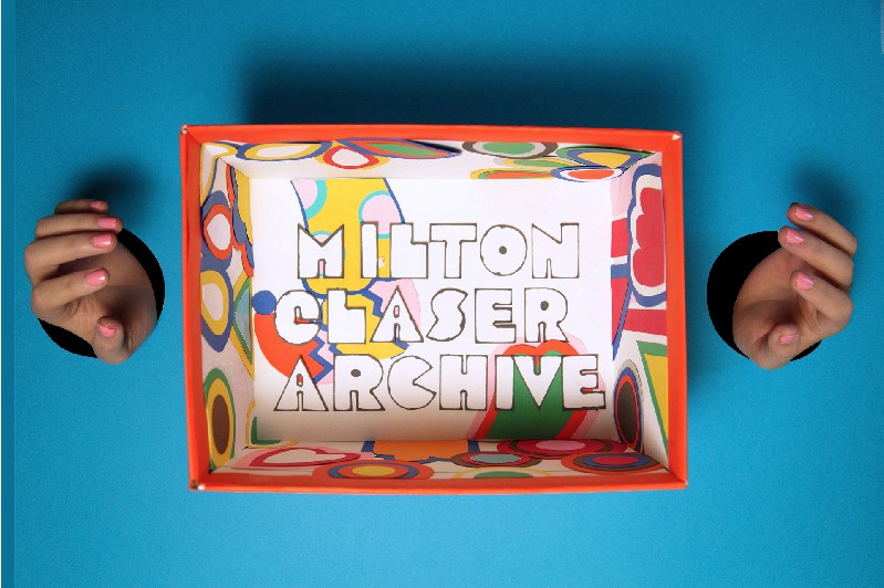 box with two hands on blue background