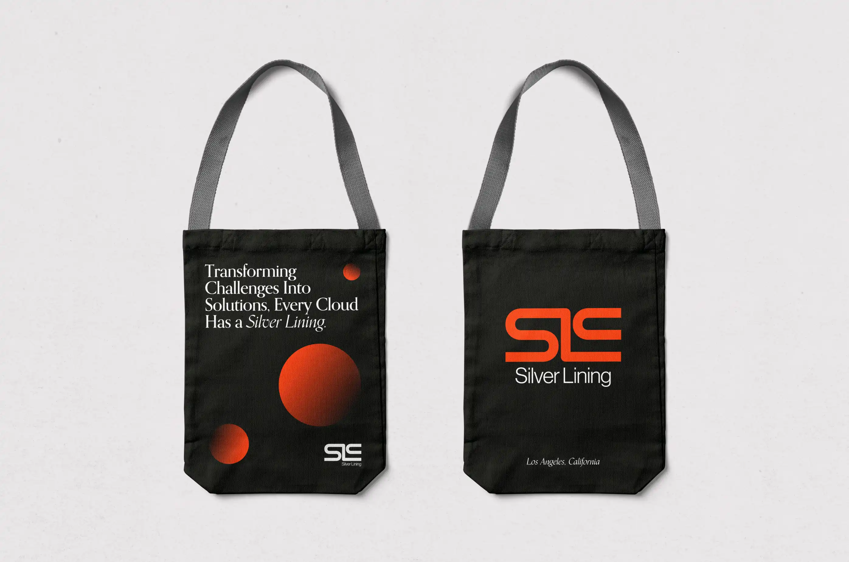 Silver Lining Consulting — Two tote bags with custom SLC design — Merchandise collateral