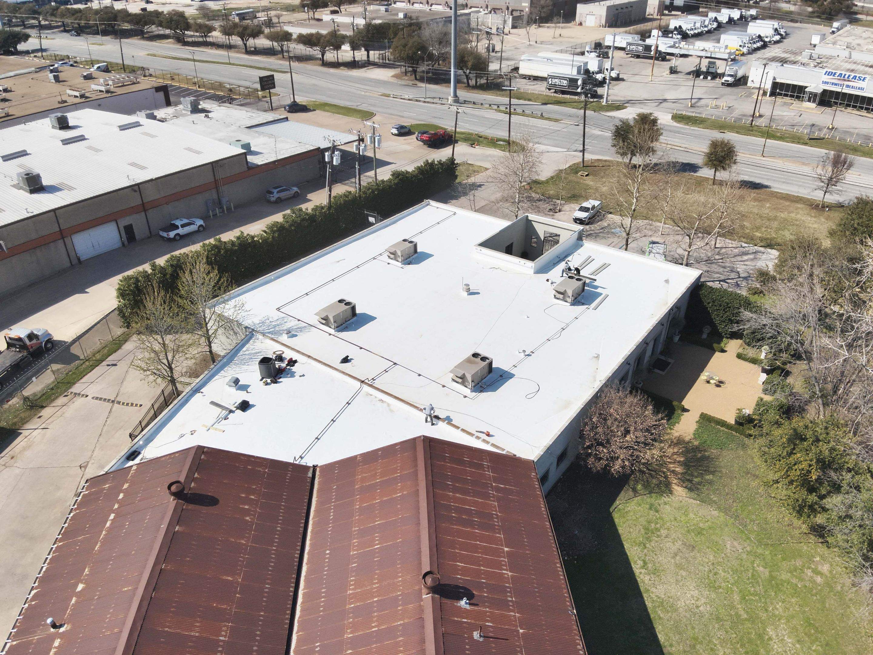 Aerial showing the new 60 mil TPO membrane wrapped around a courtyard wall on a Dallas commercial building