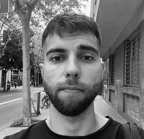 woman in black long sleeve shirt sitting on white couch