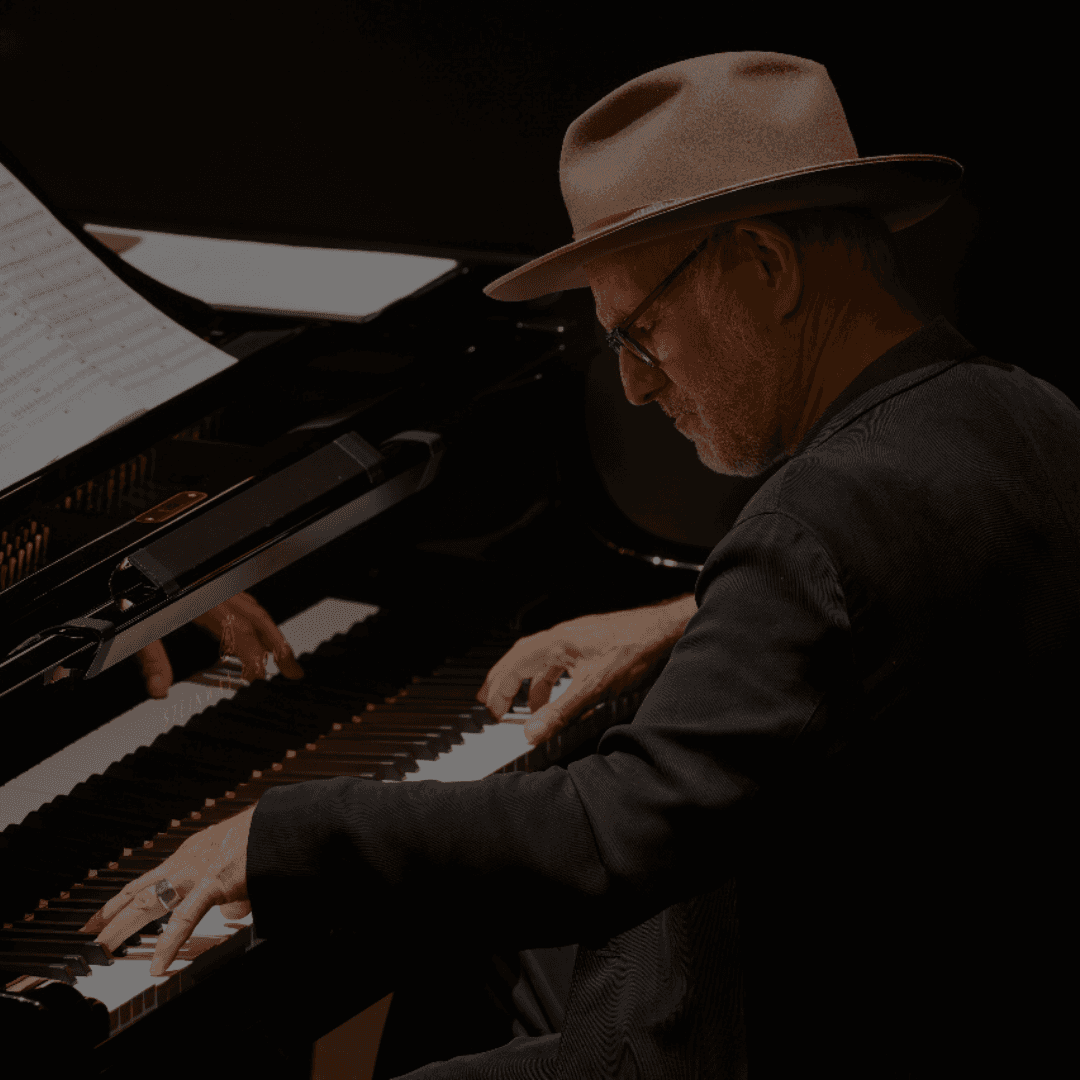 a crowd of people watching a fireworks display