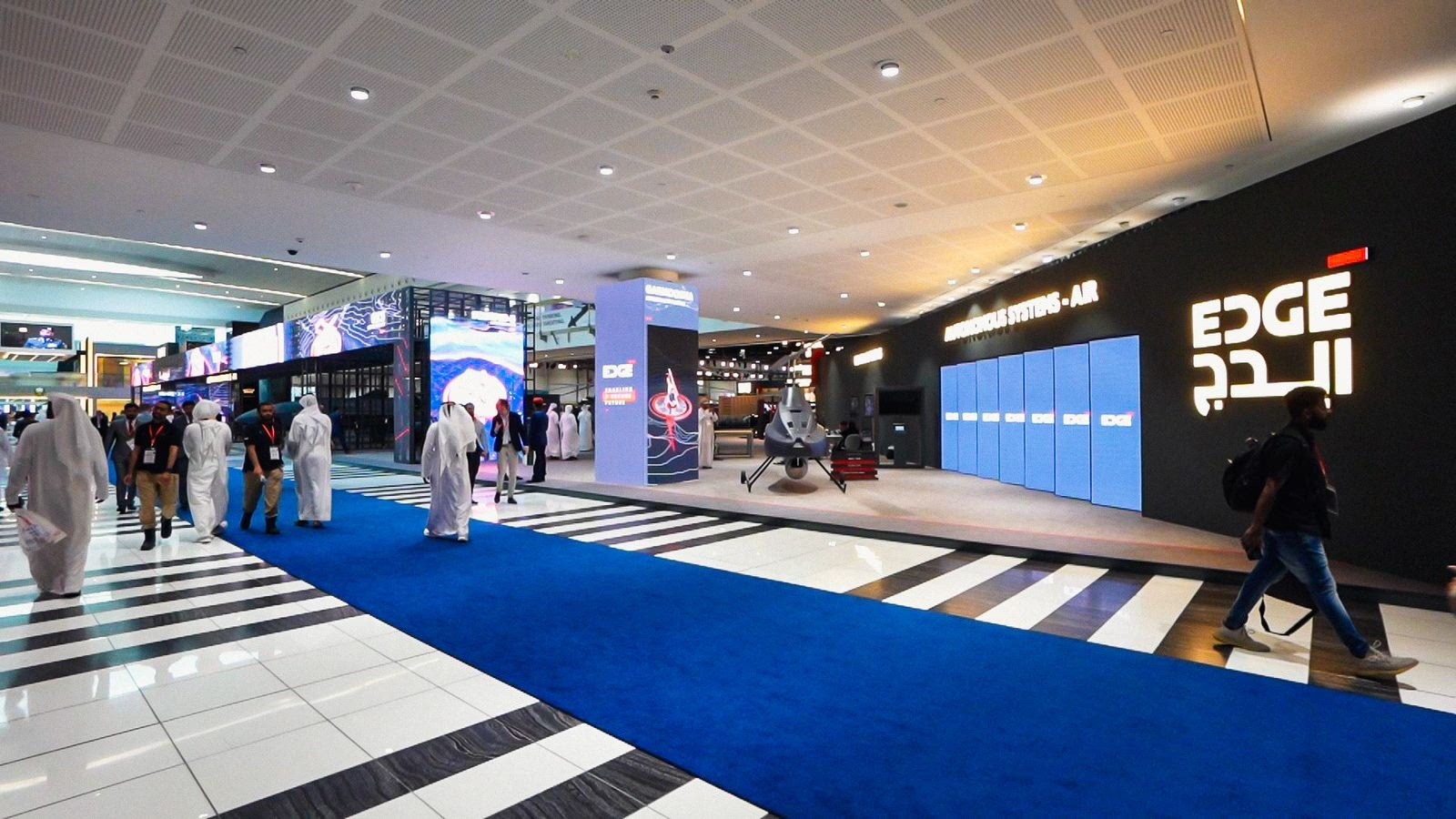 blue carpet at the booth design for edge at dubai air show