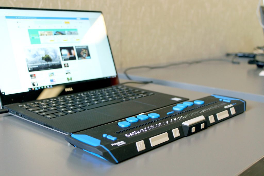 A laptop with an assistive keyboard
