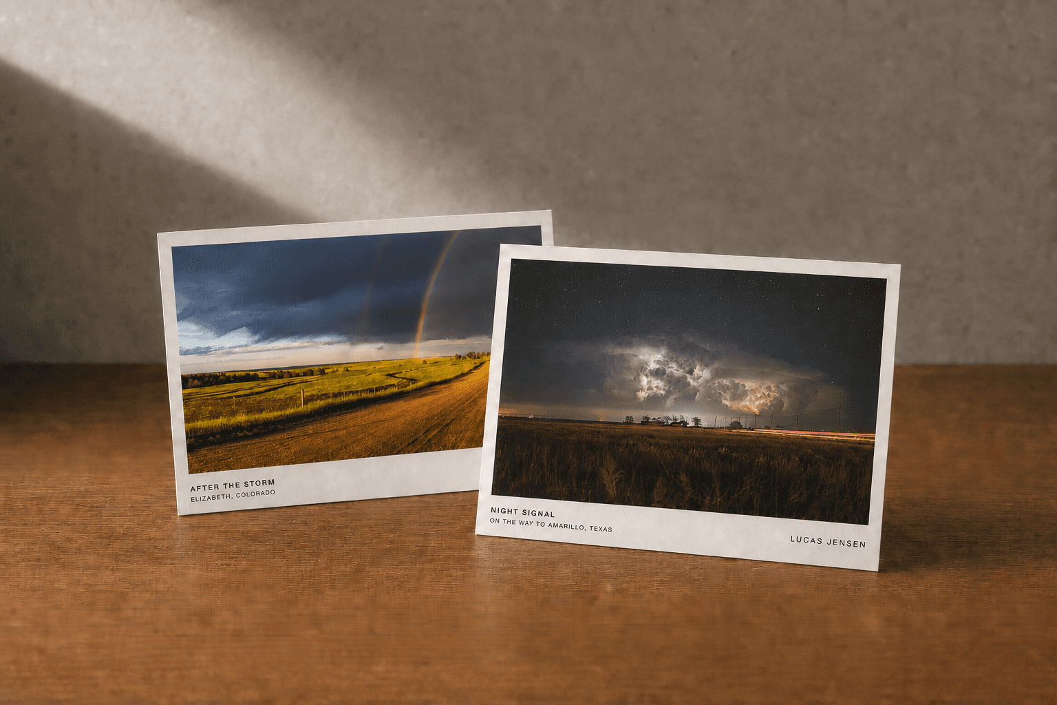 After the Storm and Night Signal 4 by 6 inch postcards together on the Edition 001 warm wood product-photo surface