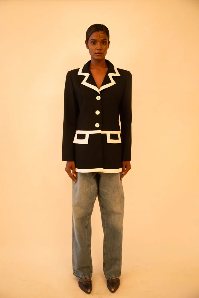 Vintage Sandro black and white fitted blazer featuring sharp tailoring and a classic silhouette, sourced from global designer archives.