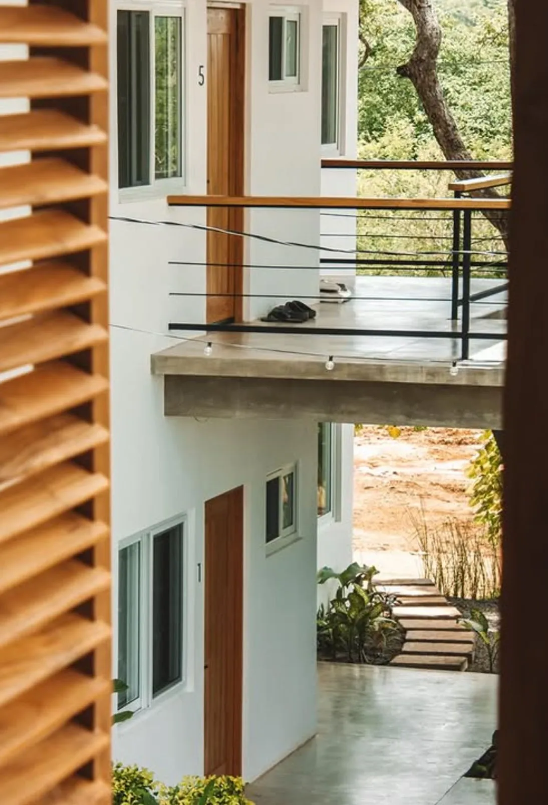 Waves and Wifi surf lodge by Costa Architecture, Popoyo Nicaragua — exterior hall