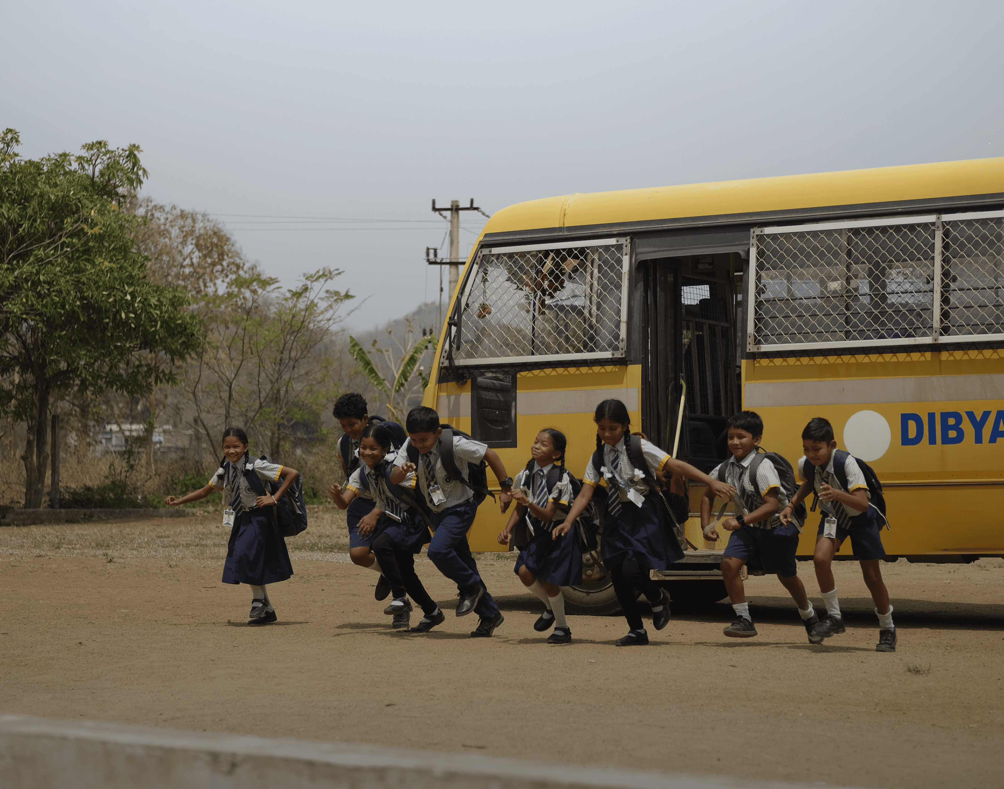woman in red shirt sitting on bus seat