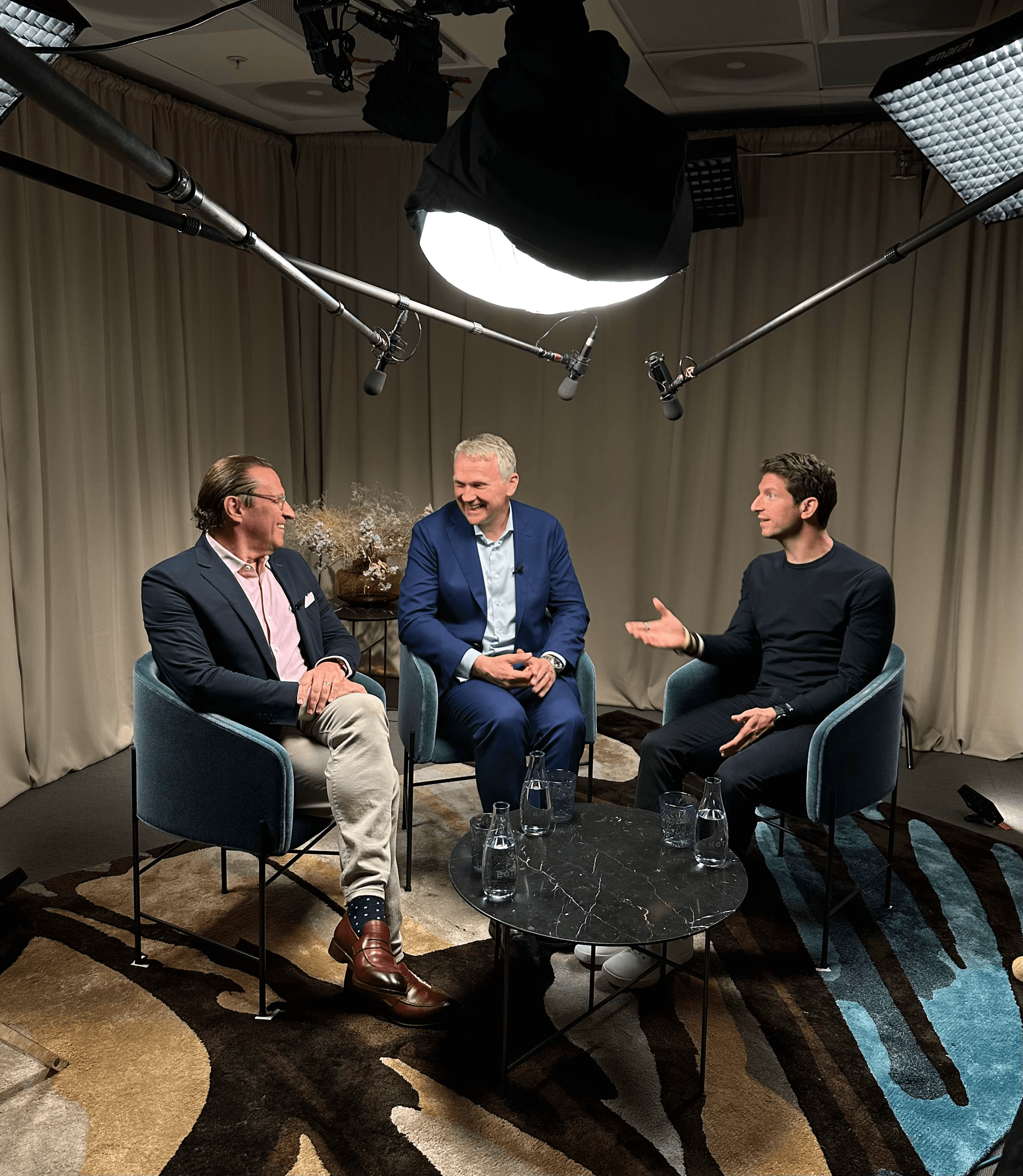 Three people in an interview-style discussion for EQT strategy.