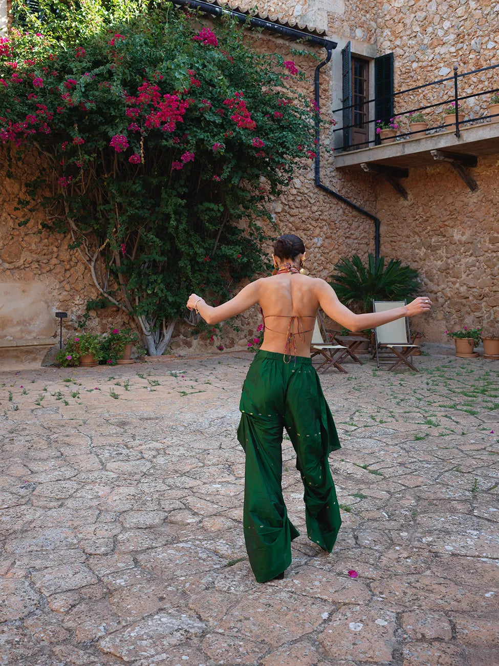 Apsara is our high-neck, backless top crafted from a vintage silk saree, inhouse by skilled artisans. 