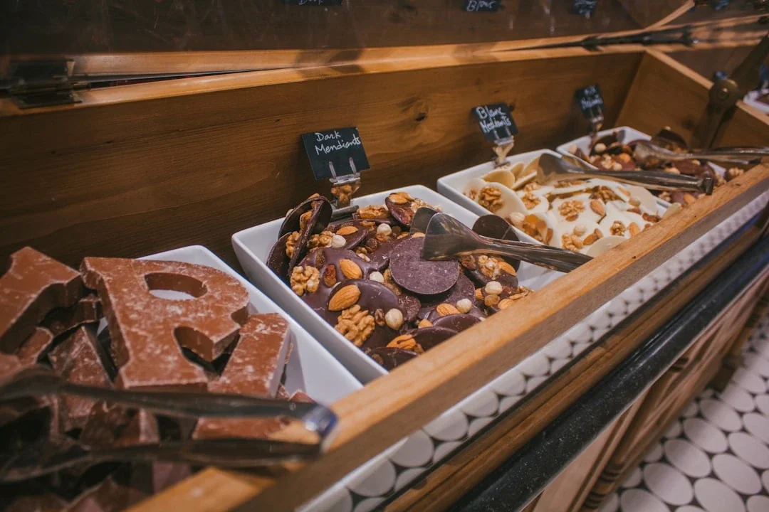 a display case filled with different types of desserts