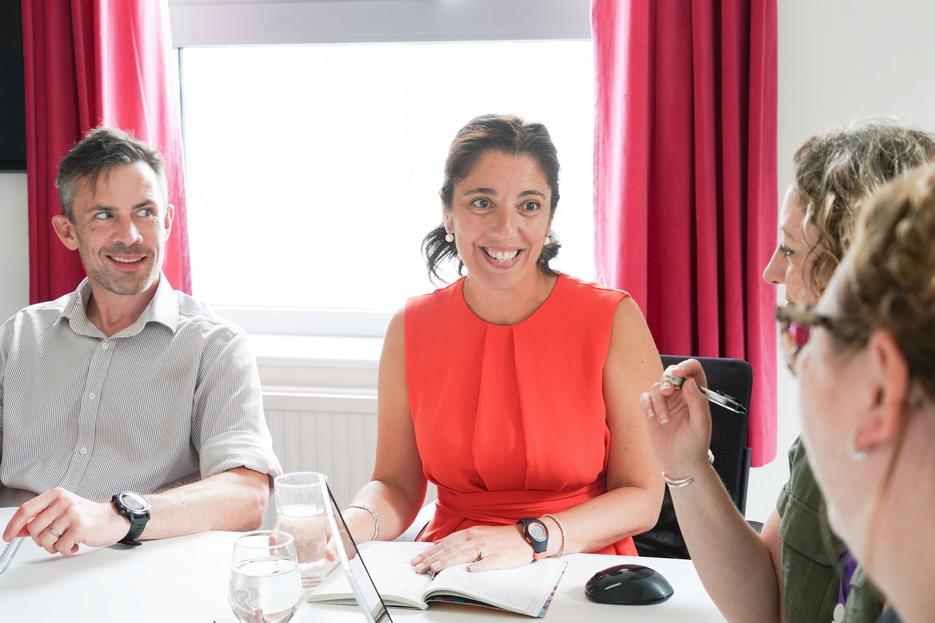 Hughes Price Walker team meeting to discuss pension scheme advice and administration services.