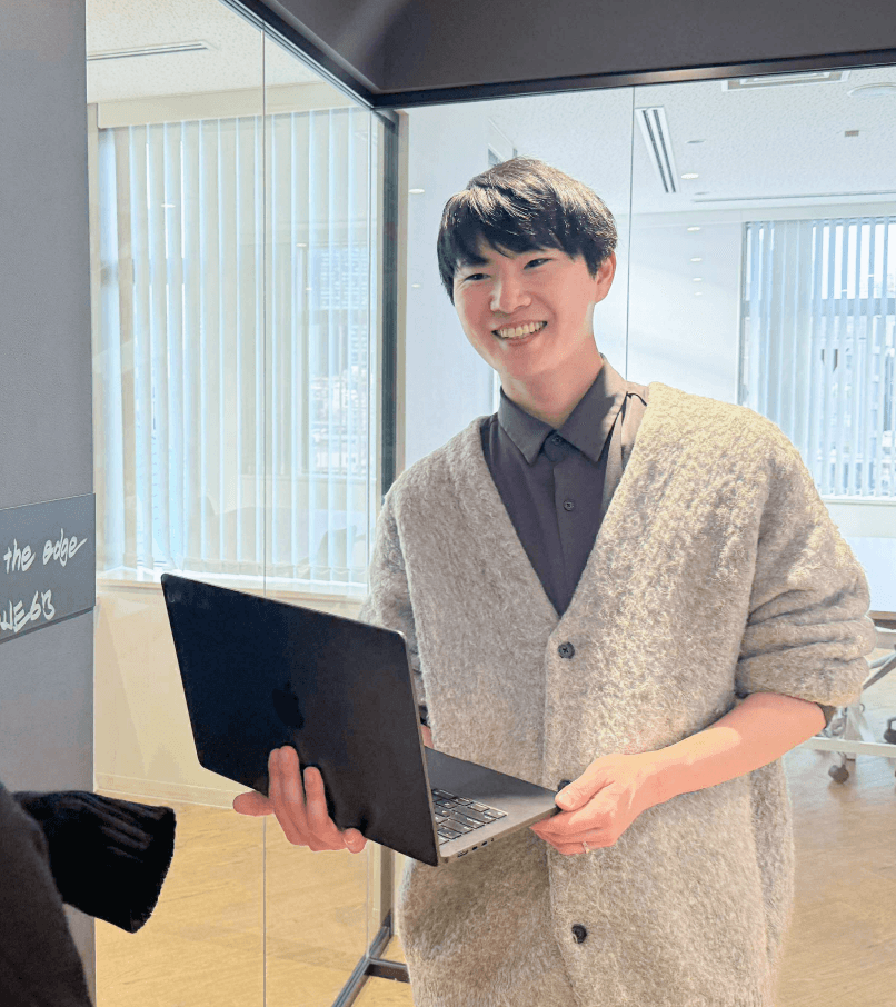turned off laptop computer on top of brown wooden table