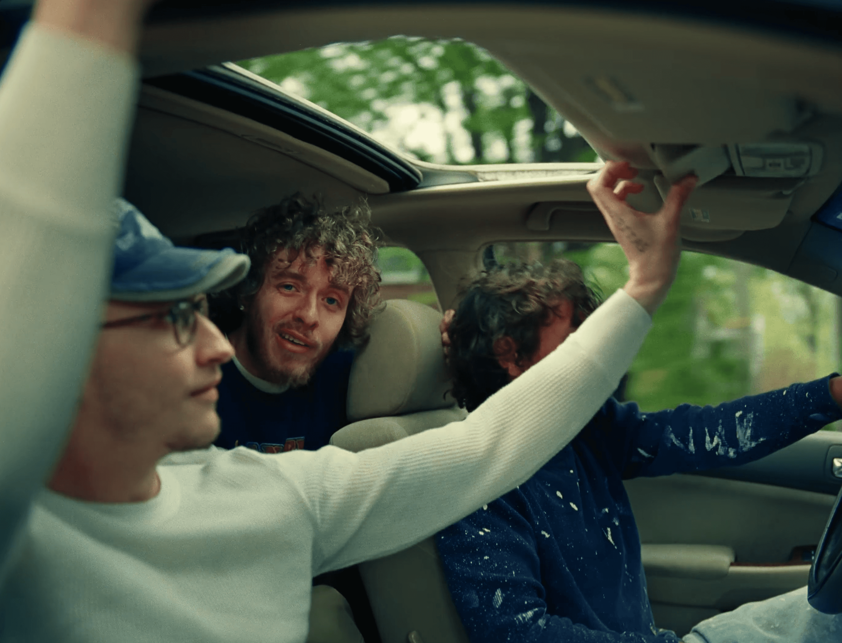 black laptop computer on brown wooden stand