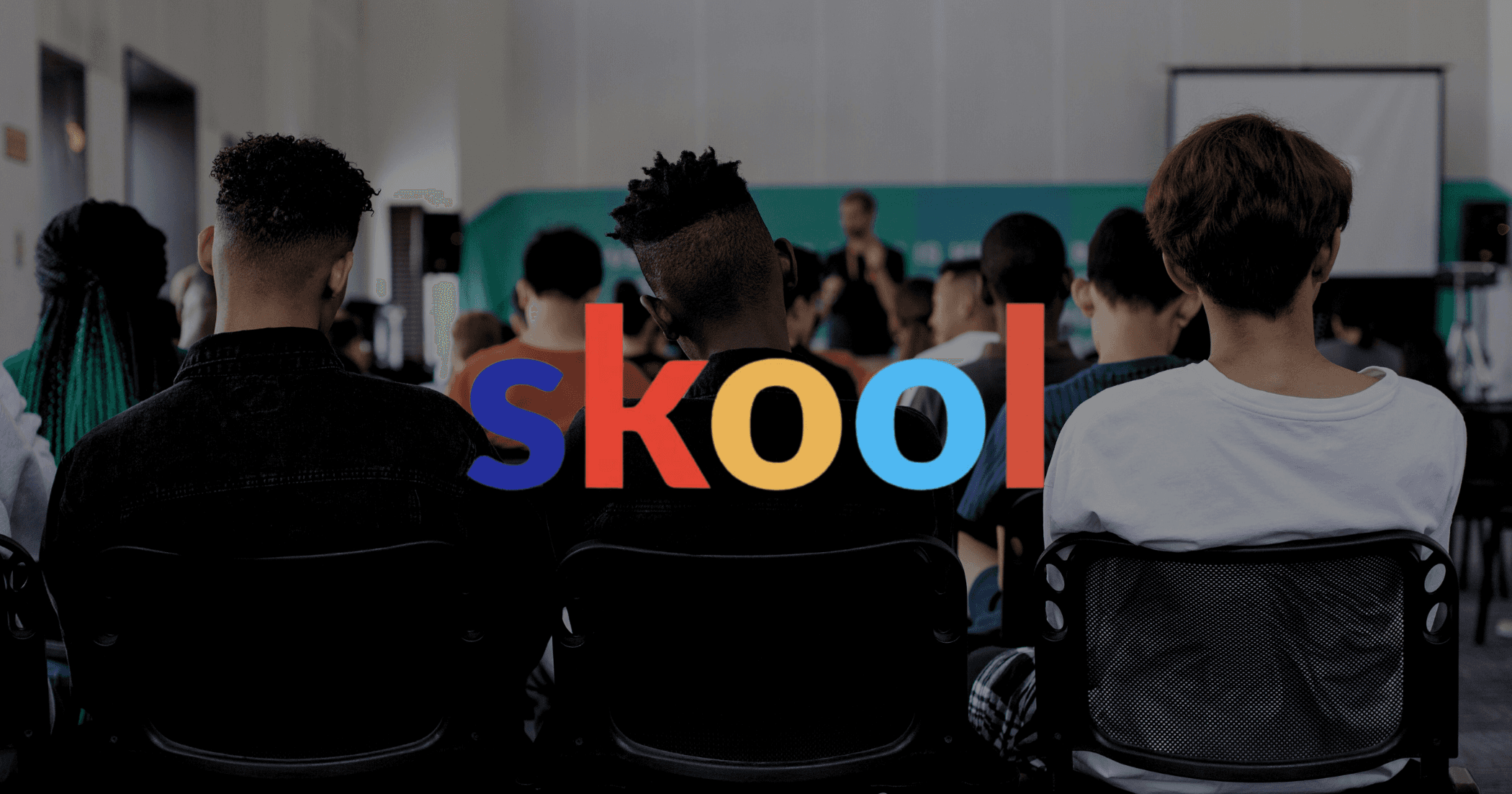 Students in a School room with a skool community platform logo