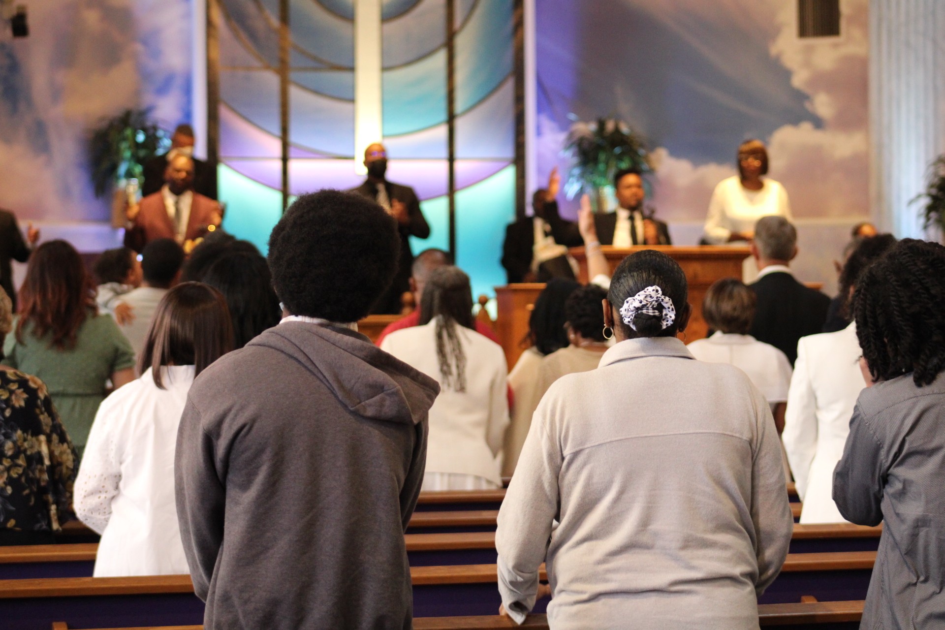 Congregation worshipping during a service at Peace Apostolic Church in Carson, California
