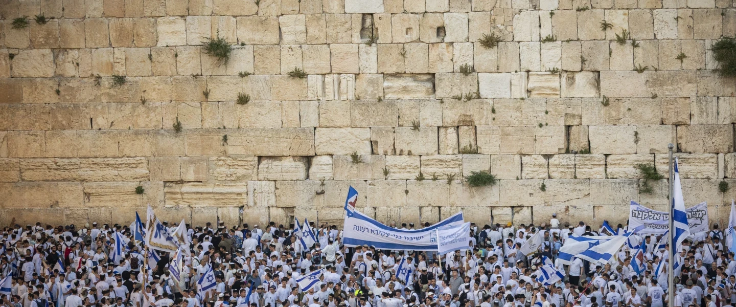 Jews celebrate Jerusalem Day at the Western Wall in the Old City of Jerusalem on the eve of Jerusalem Day, on May 14, 2026. Photo courtesy of Yonatan Sindel/Flash90.