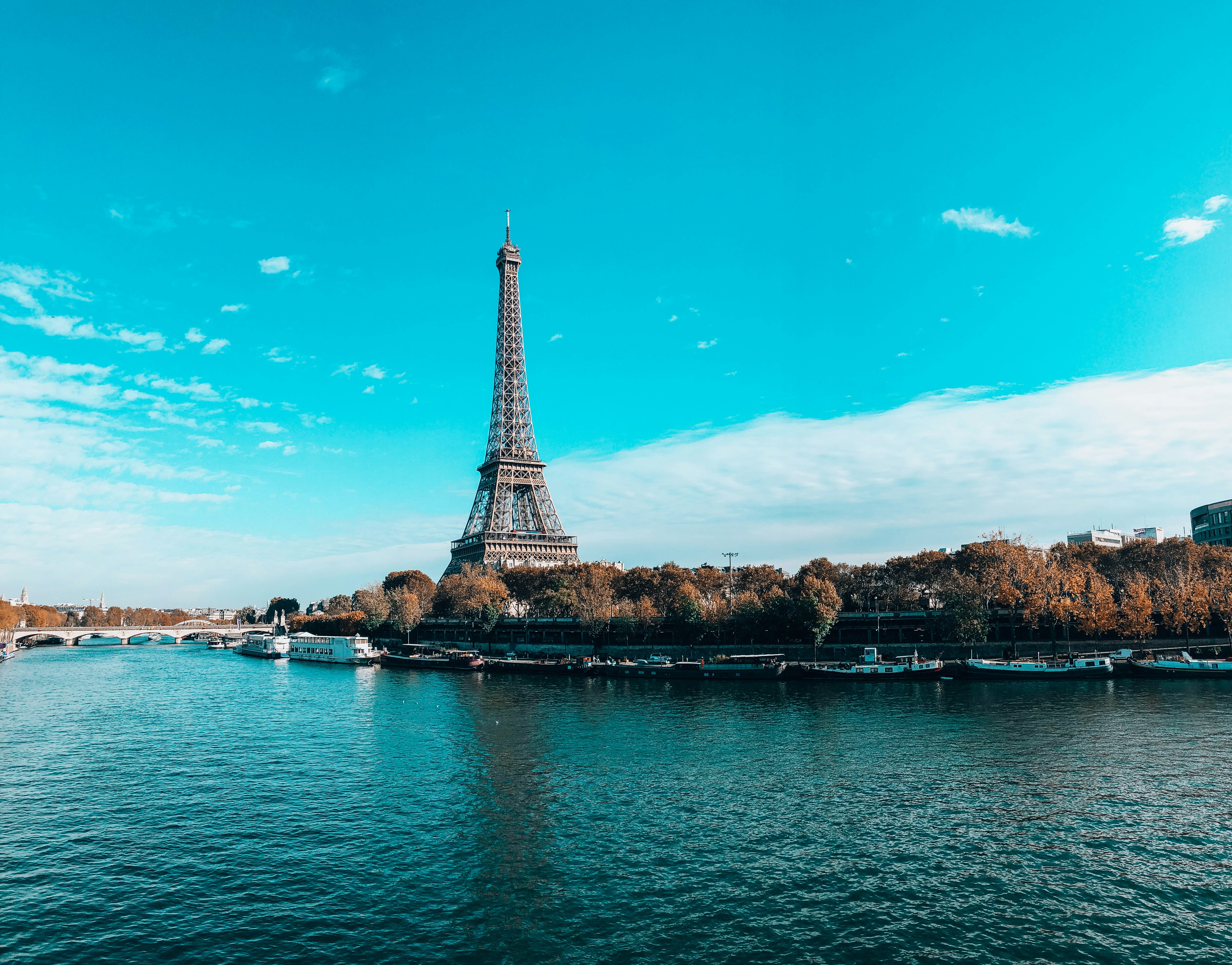 eiffel tower near body of water during daytime