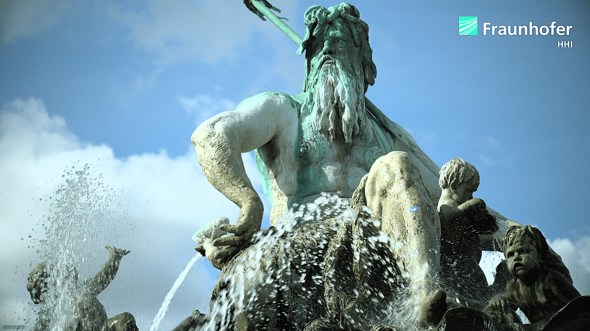 Fountain image illustrating turbulent water and smooth sky