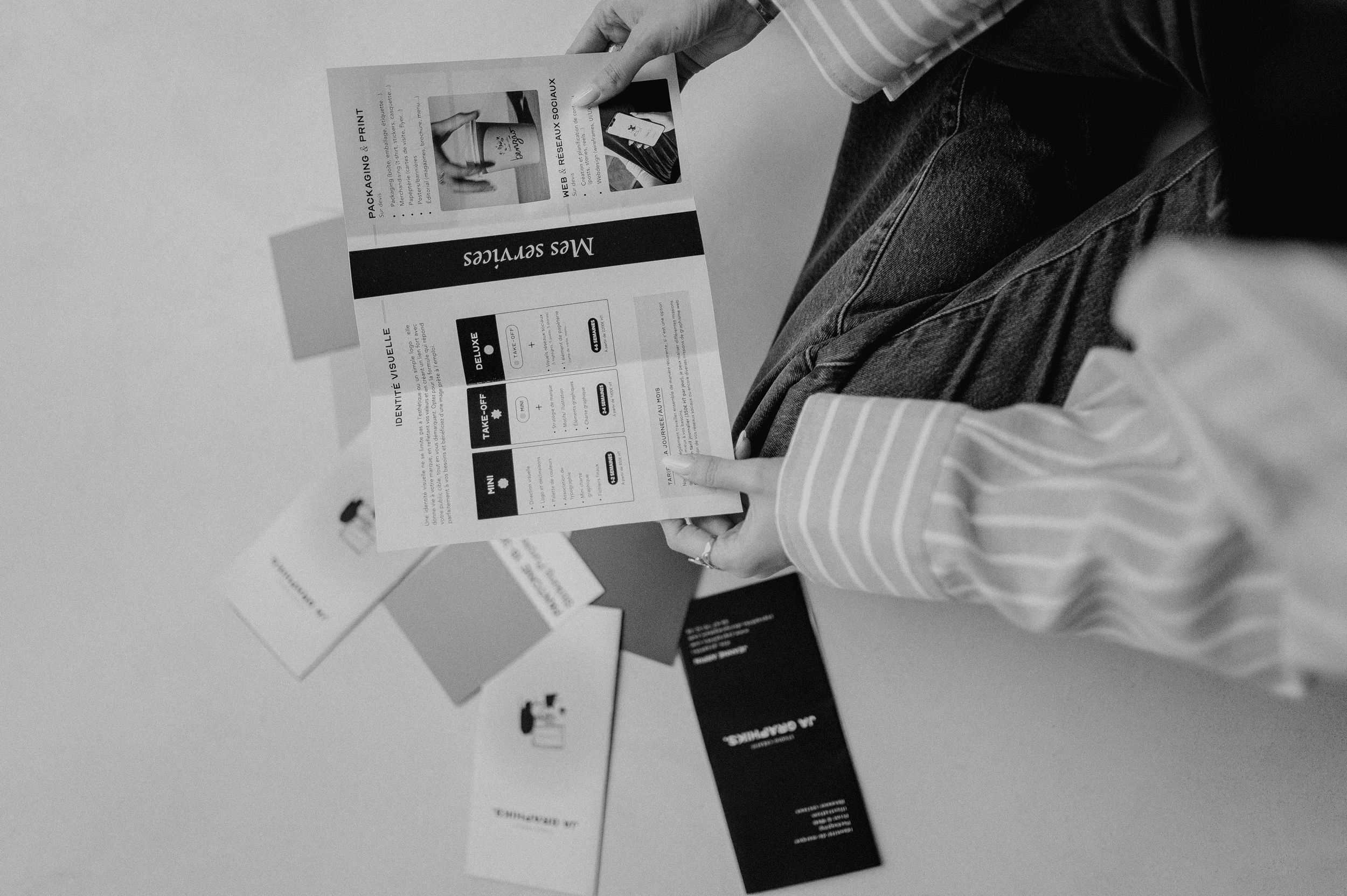 man in black shirt sitting in front of computer