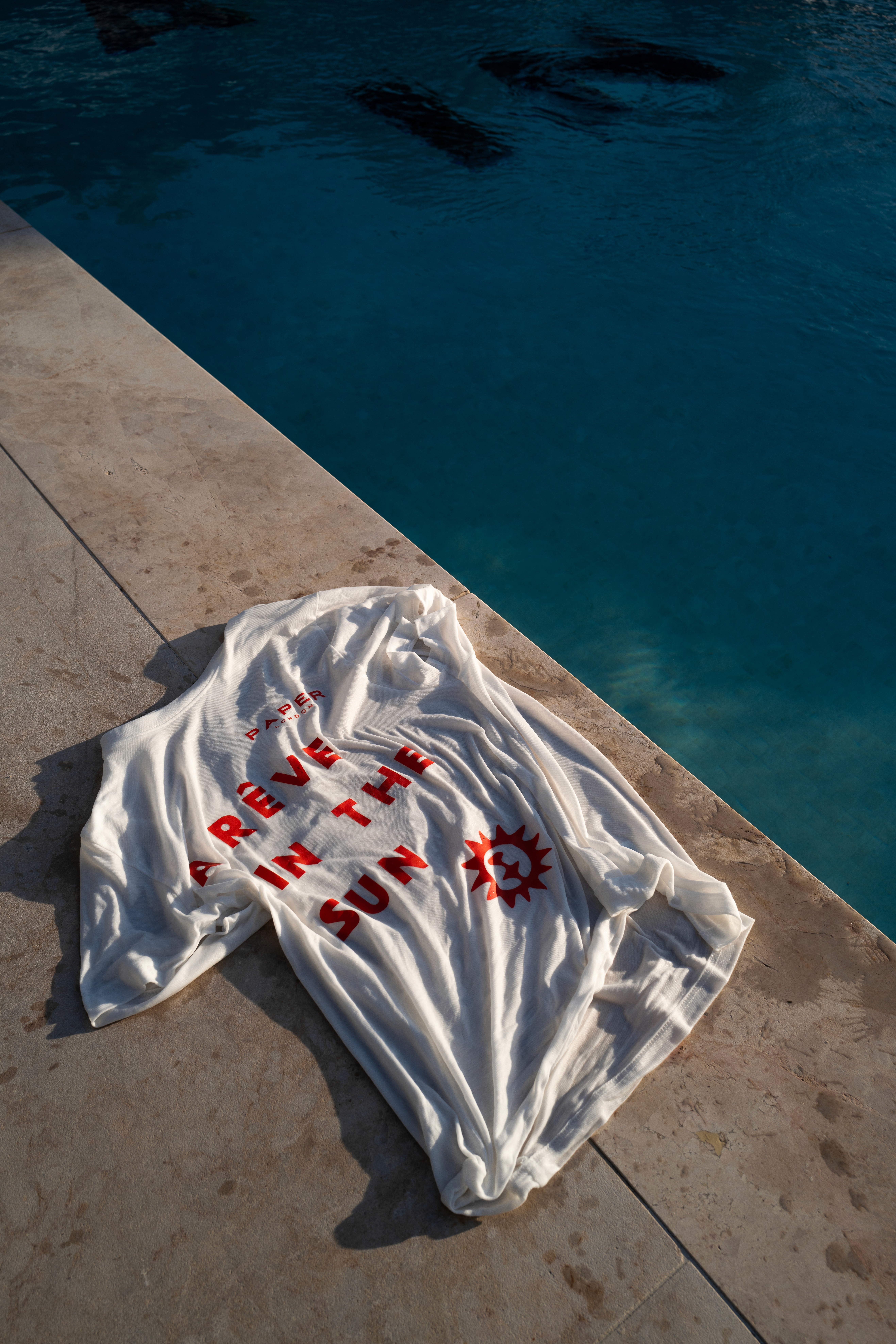 Bride in white dress walking on street, blurred motorcycle passing