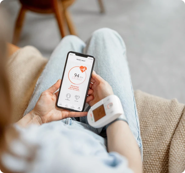 Woman measure heart rate and pressure with smart technology