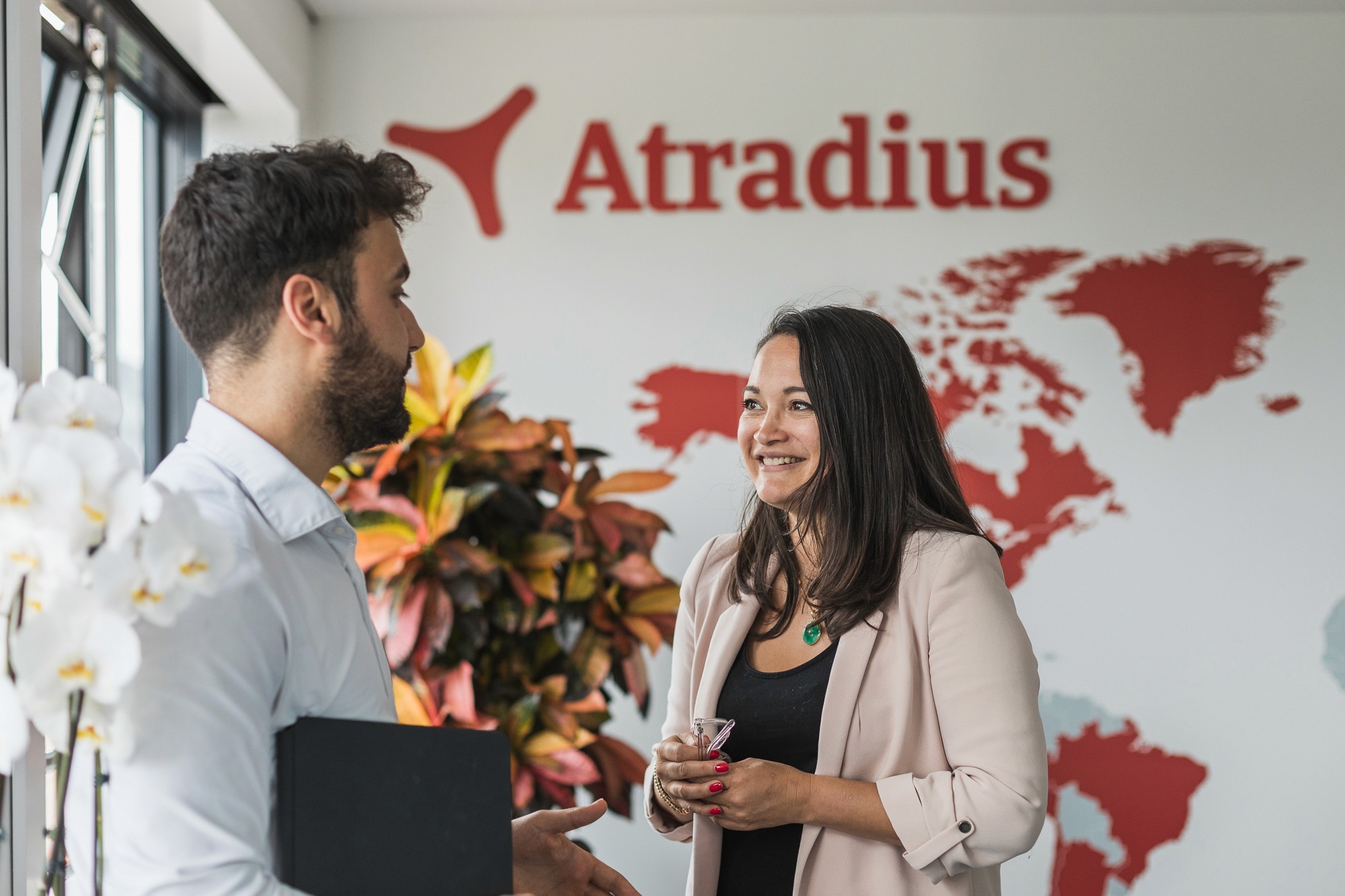 Two employees discussing in Atradius office in France