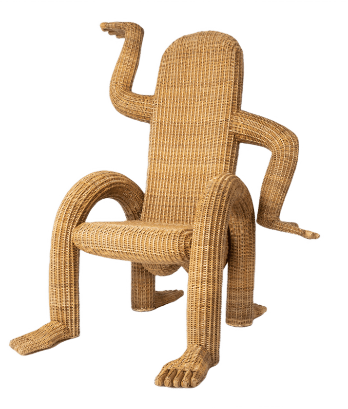 A unique wicker chair creatively designed to resemble a humanoid shape, featuring long arms and legs, making it an eye-catching piece of furniture art.