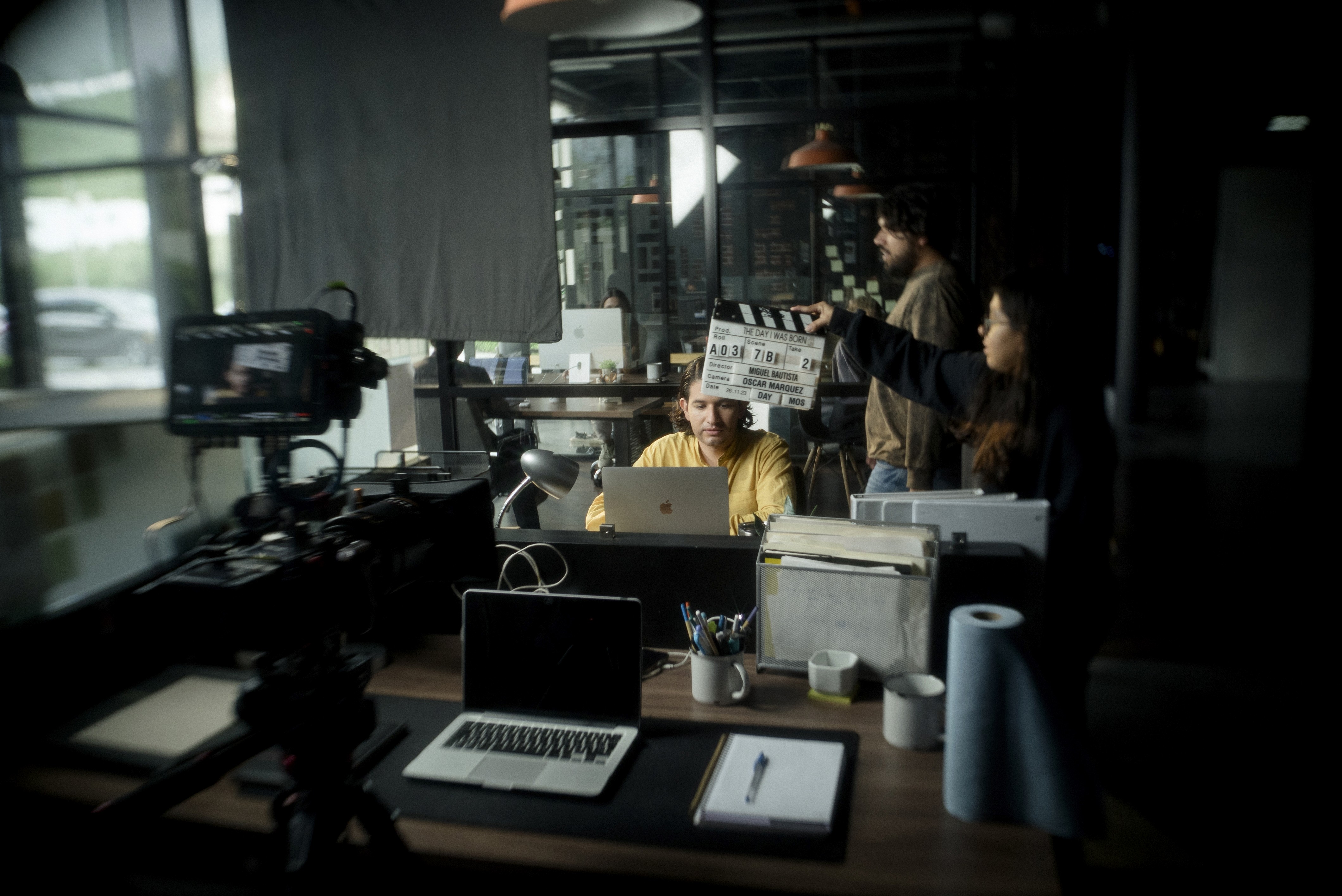 Director Mike Bautista on the set of Ed Sheeran's music video, showcasing professional film production and creative leadership.