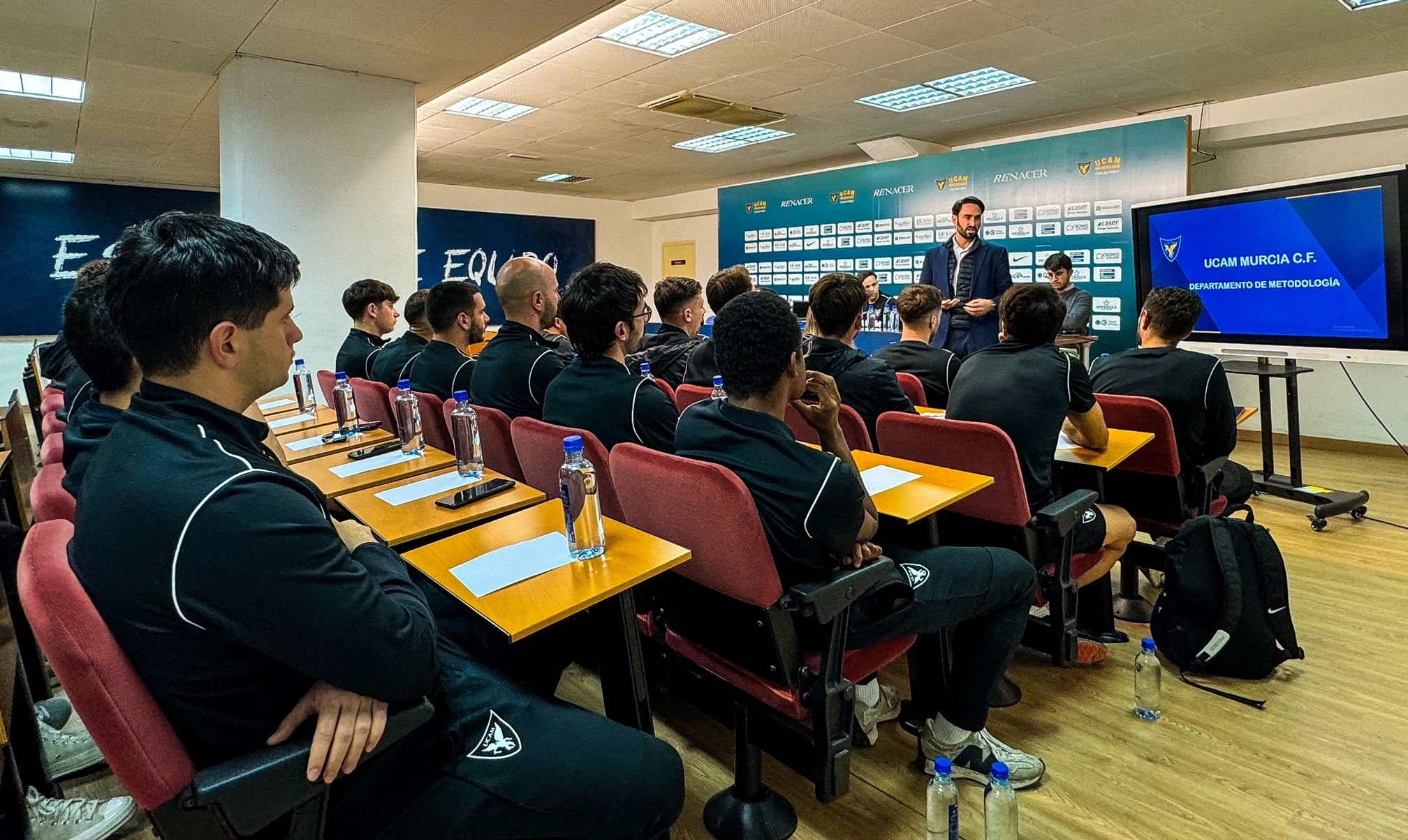 Players of the UCAM International Football Team attending a technical briefing at the facilities of UCAM Murcia CF | UCAM Catholic University of Murcia