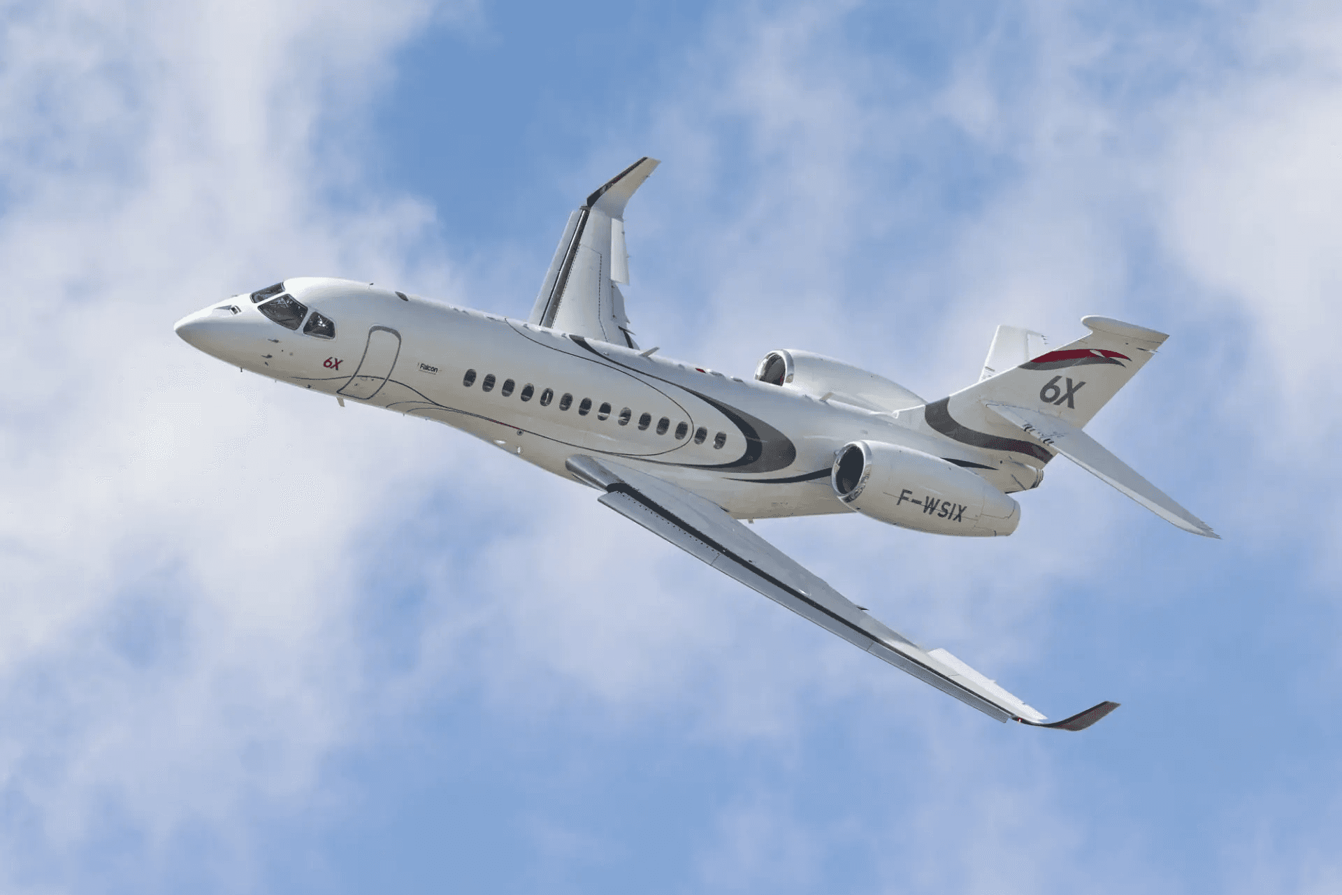 white airliner on gray pavement