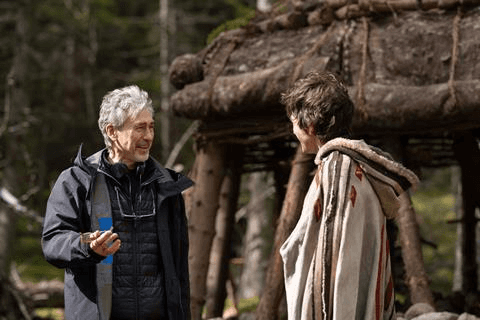 Tony Gilroy and Diego Luna talking on set of Andor