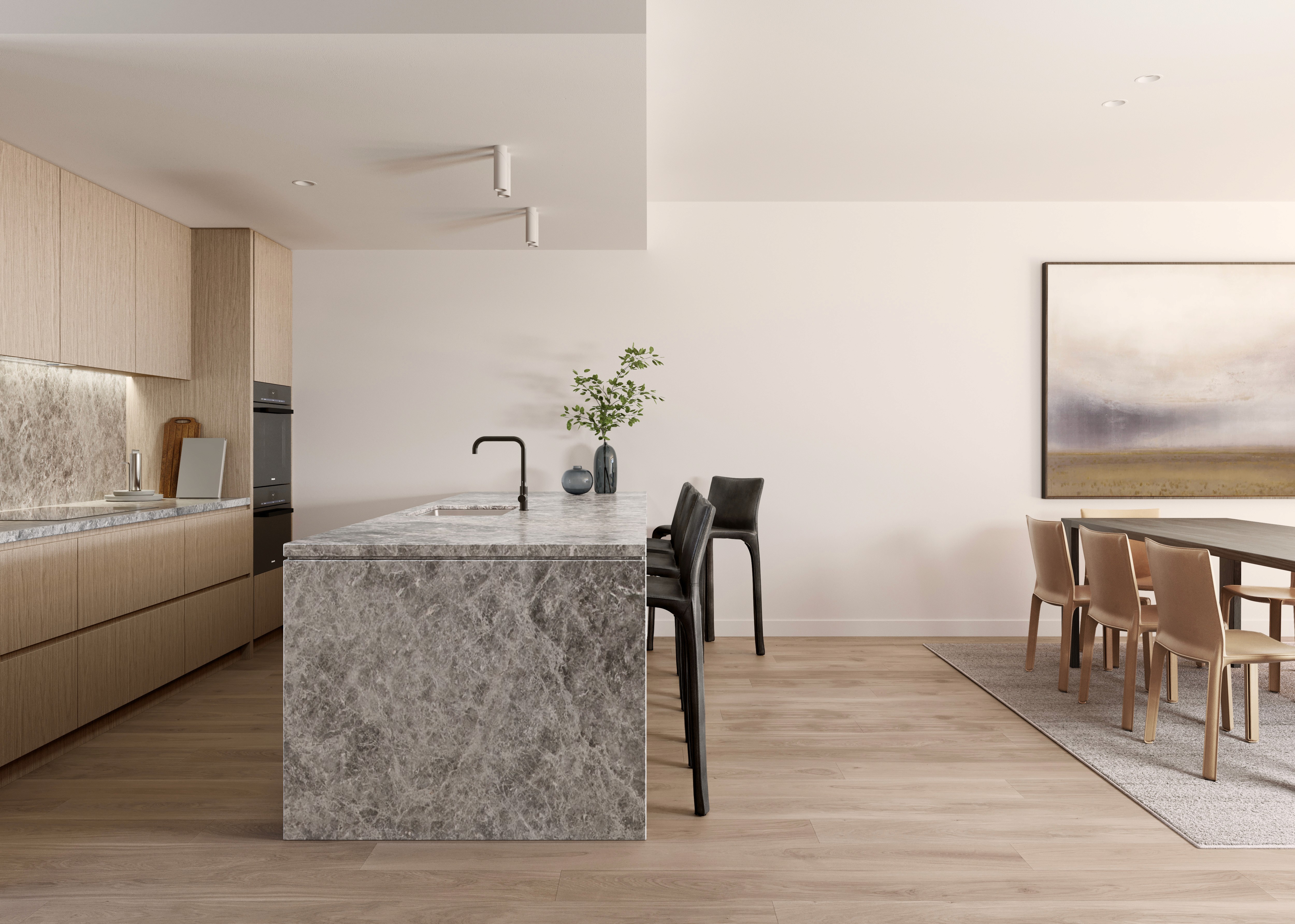 Modern kitchen and dining area with marble countertops and wooden furniture.