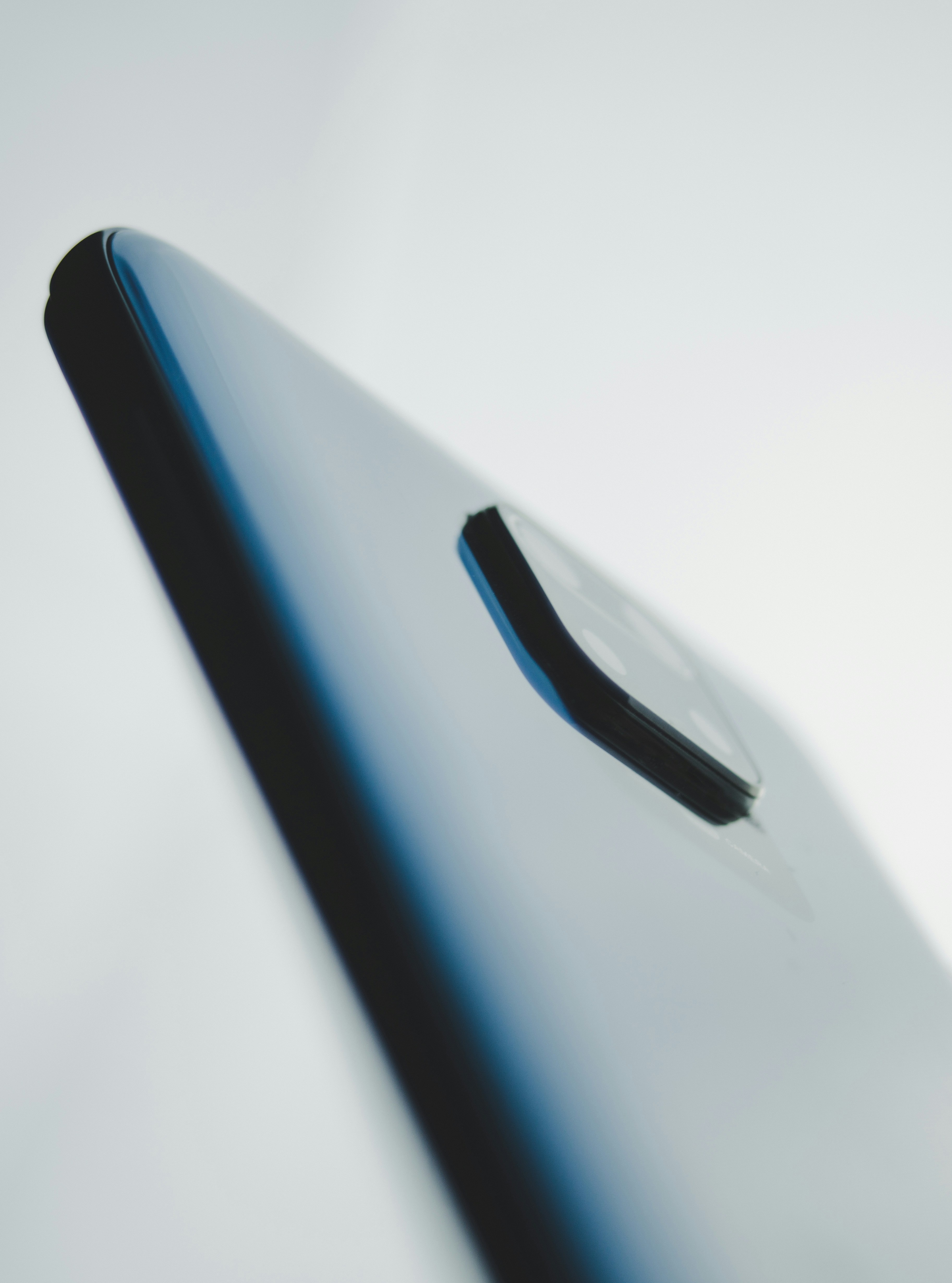 Close-up of a smartphone's SIM tray slot on its edge