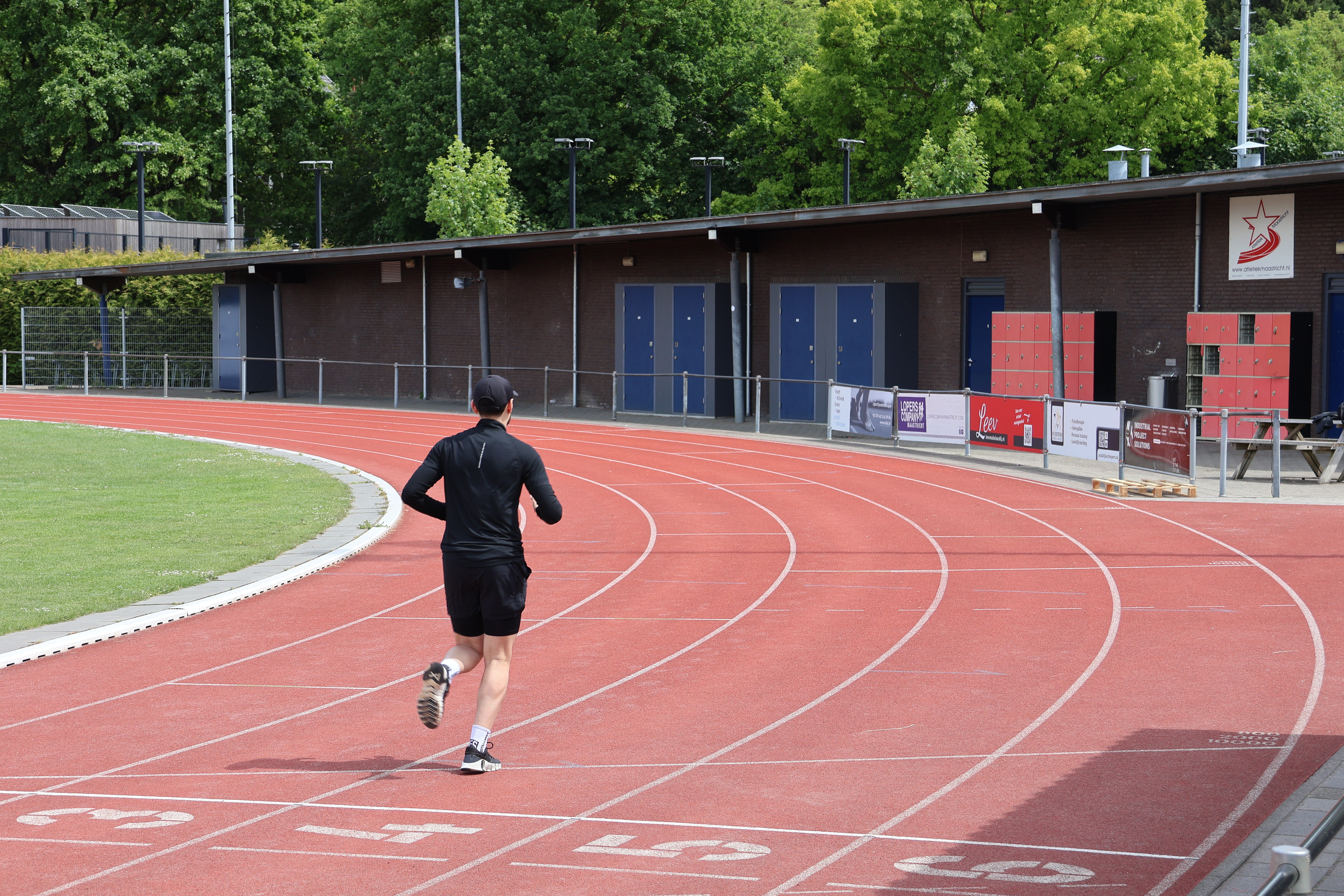 Runners legs in motion on asphalt. Running shoes and healthy legs.