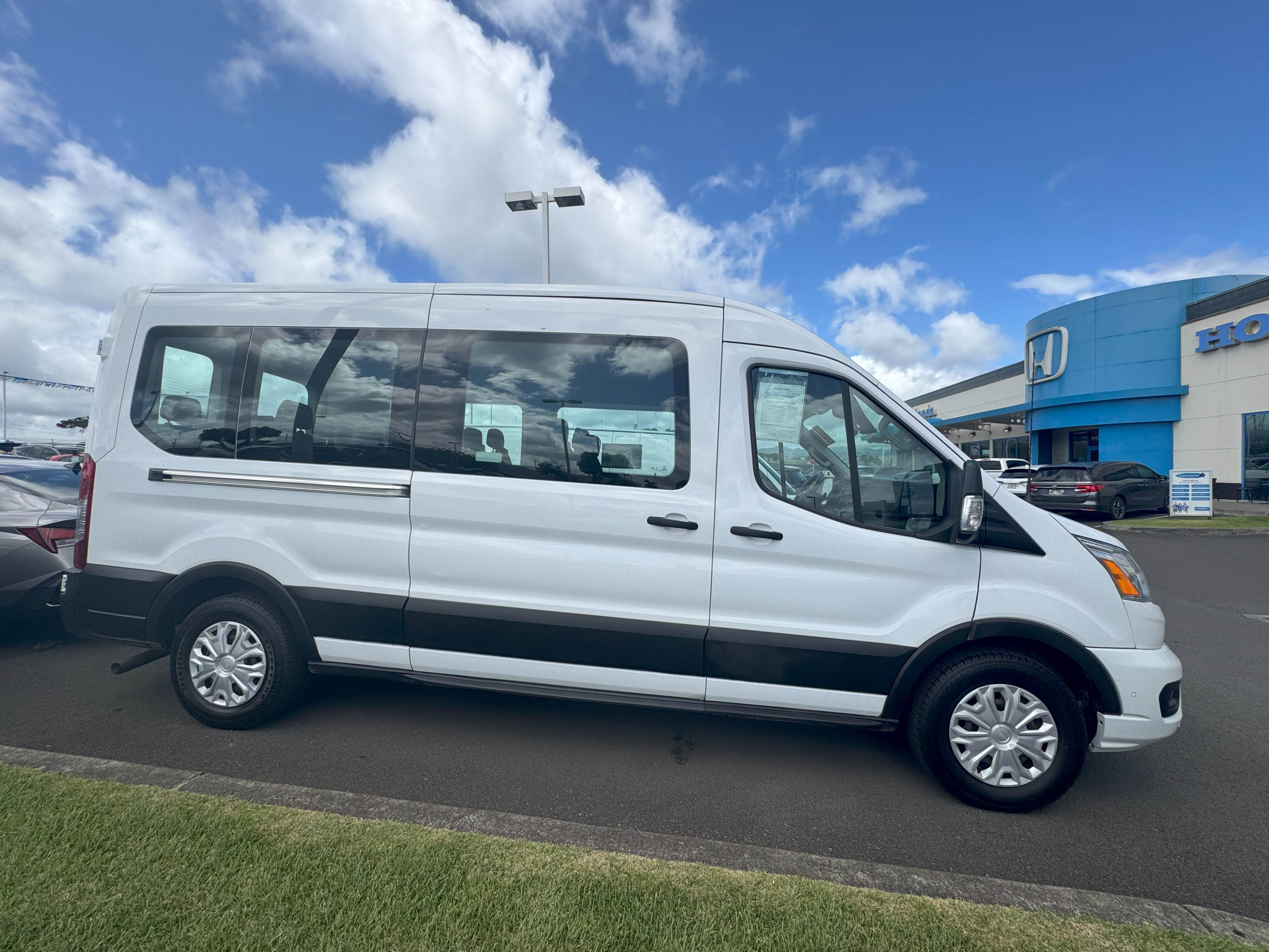 White Ford Transit XLT 15 Passenger Van Hawaii Big Island Sunset For Rent