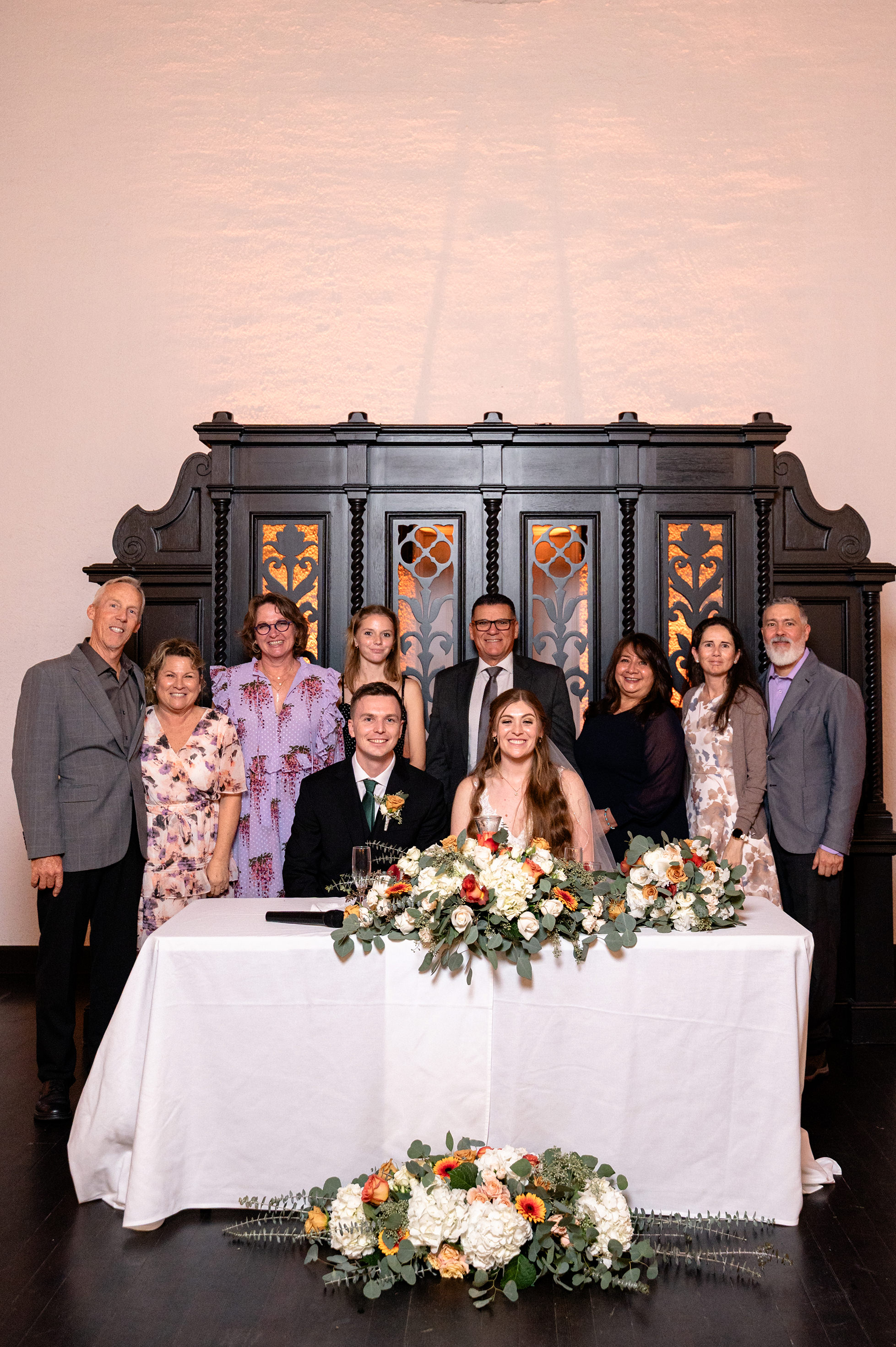 Flat lay wedding details with bouquet, rings, and sparkling bridal heels