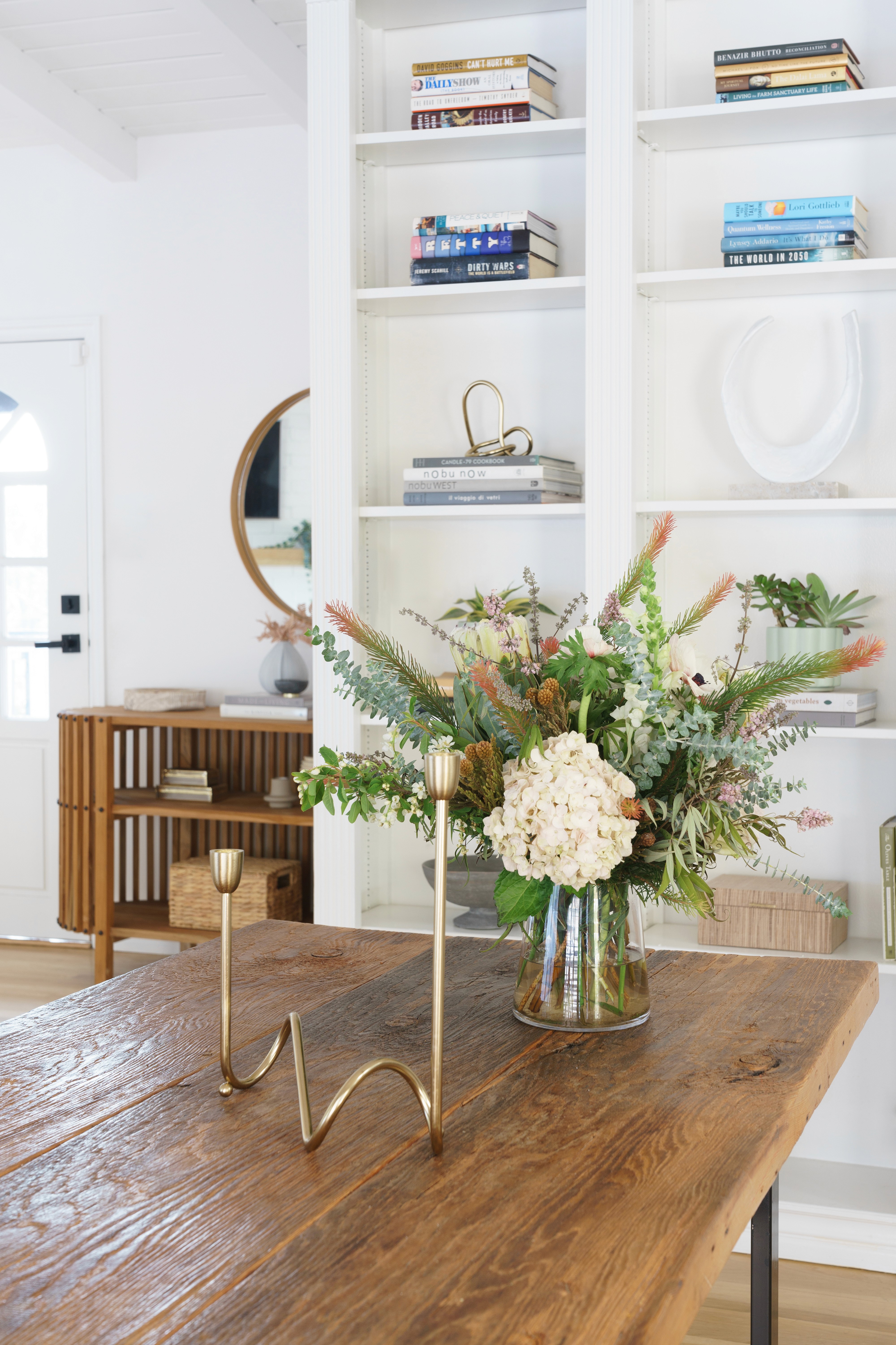 Mid-century living room refresh with a blend of classic design and contemporary comfort  by Ventura & Los Angeles interior designer Jubilee Interiors