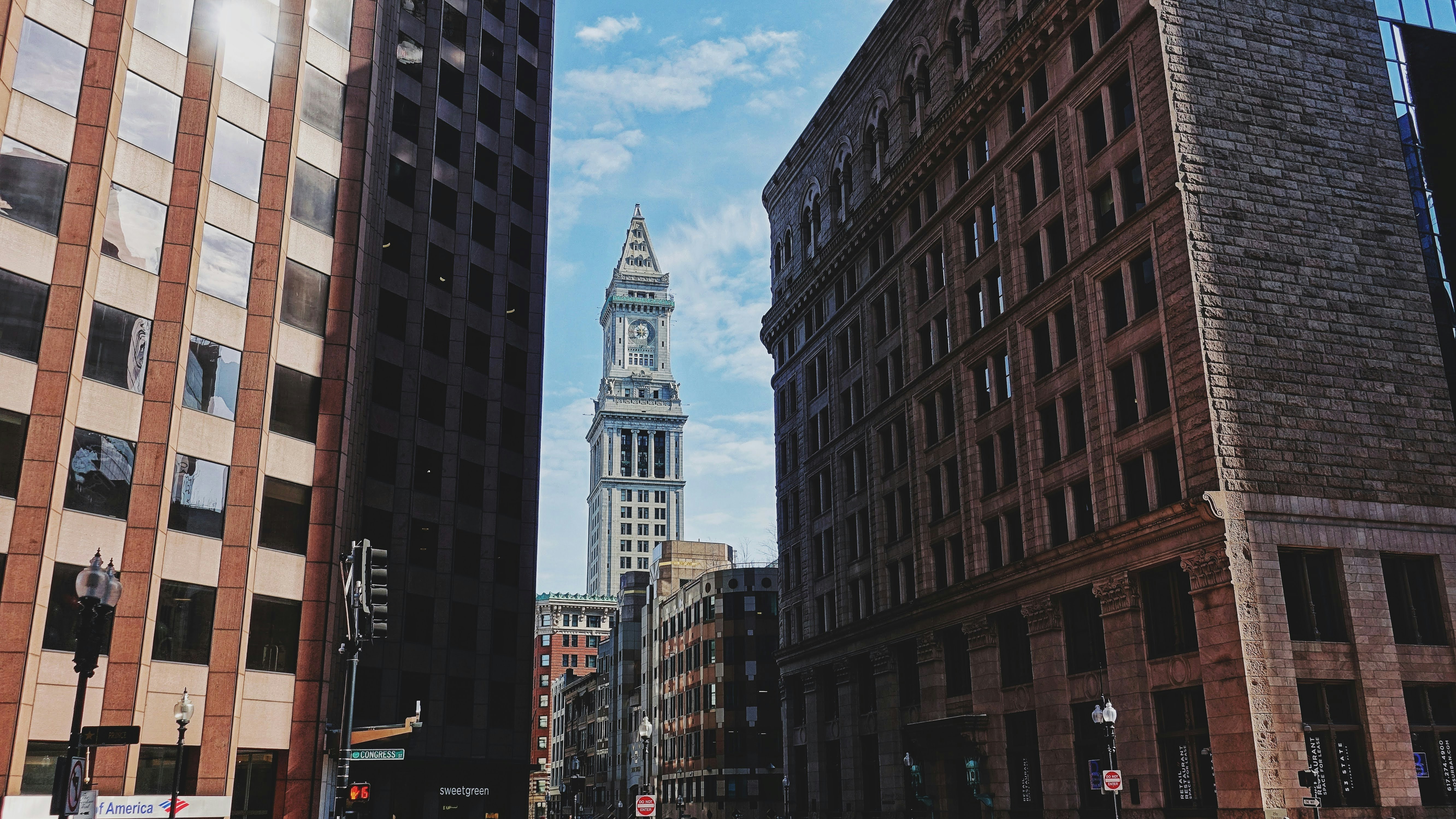 a tall clock tower towering over a city