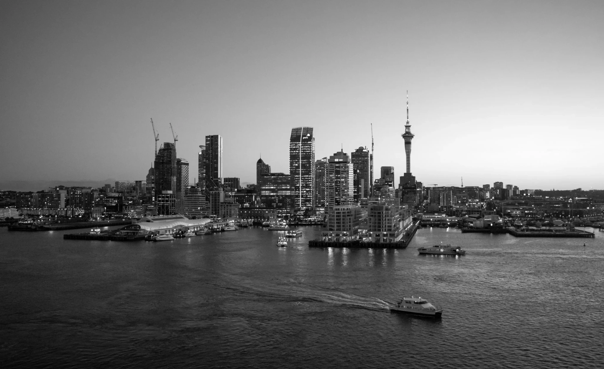 Auckland skyline with Sky Tower New Zealand private jet charter destination
