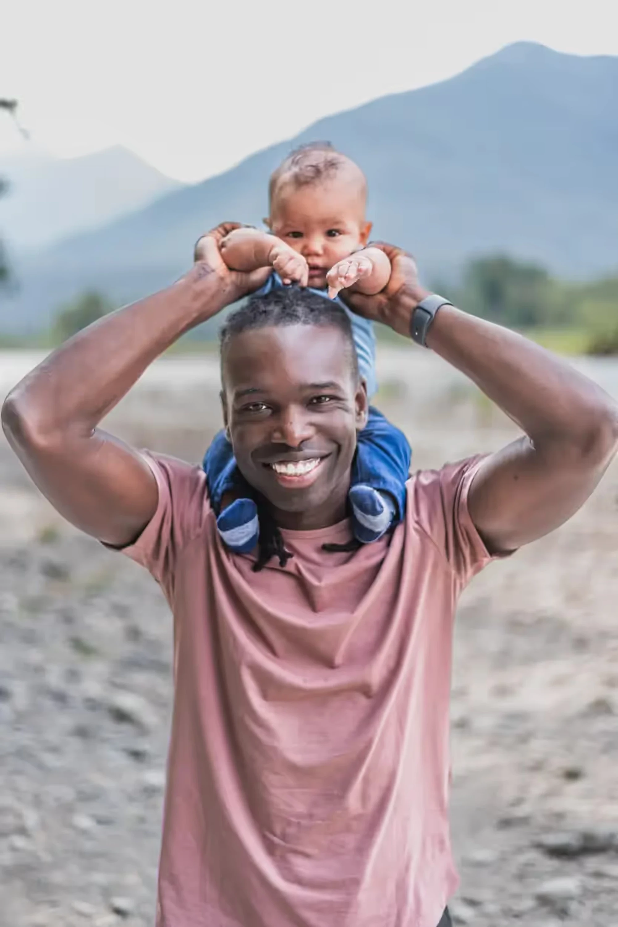 Father holding his baby during a lifestyle photography session